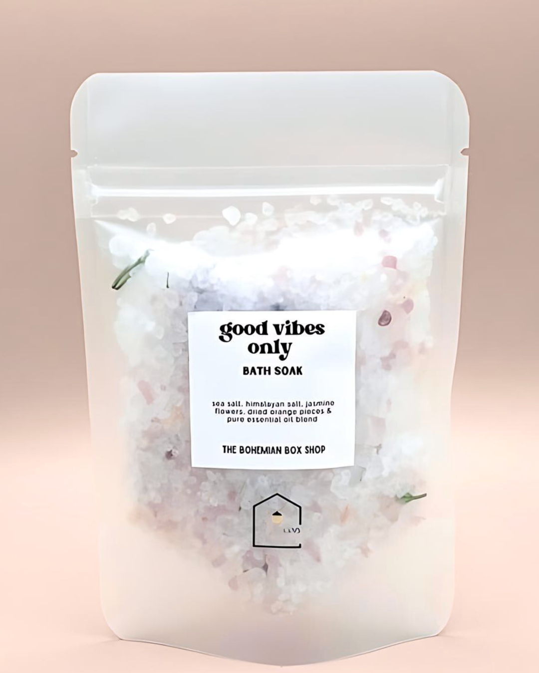 Bath soak package with 'good vibes only' label on a pink background