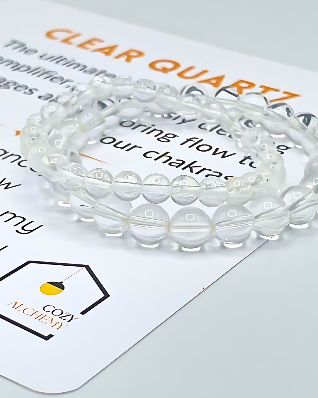 Clear quartz bracelet on a branded card with text