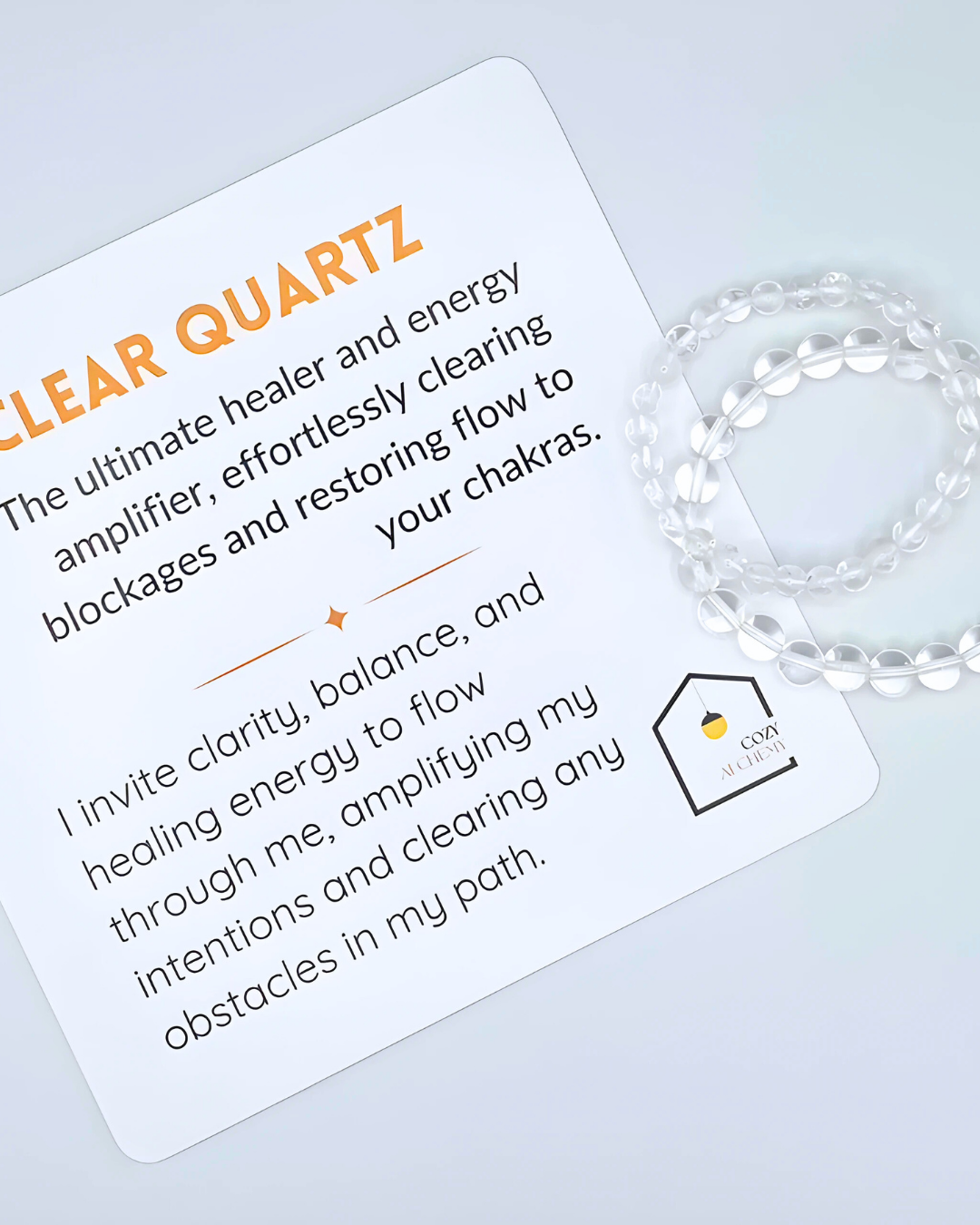 Clear Quartz product card with text and a clear crystal on a light gray background