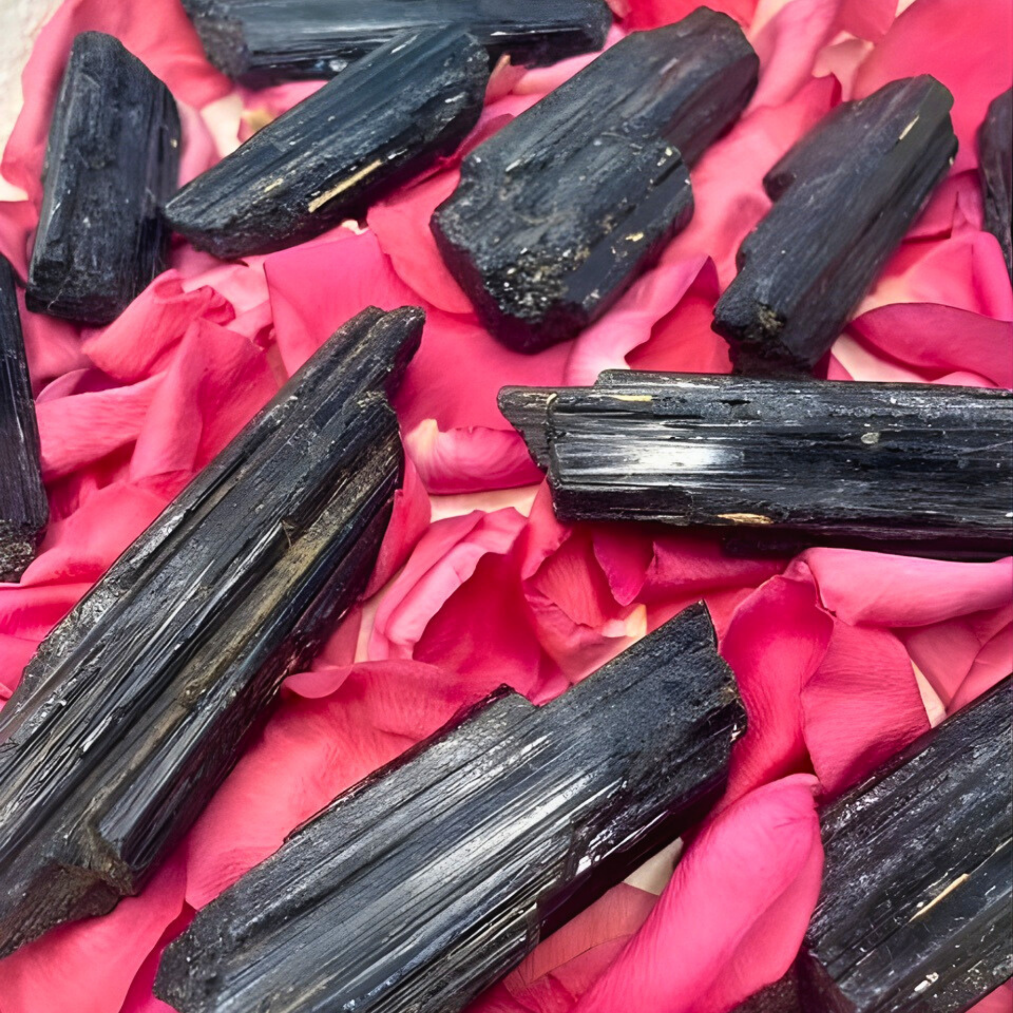 Black crystals on pink fabric