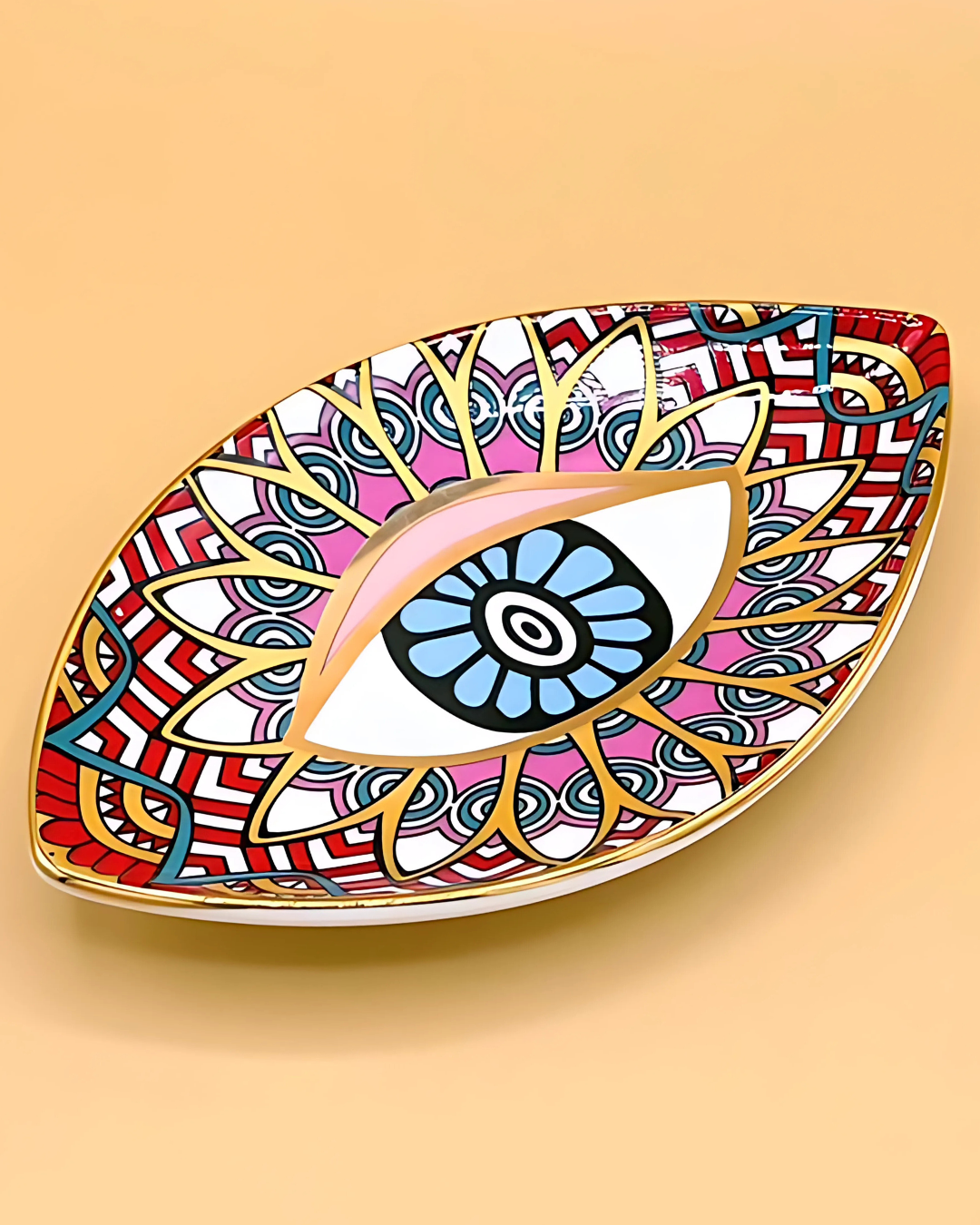 Decorative plate shaped like an eye with colorful patterns on a beige background