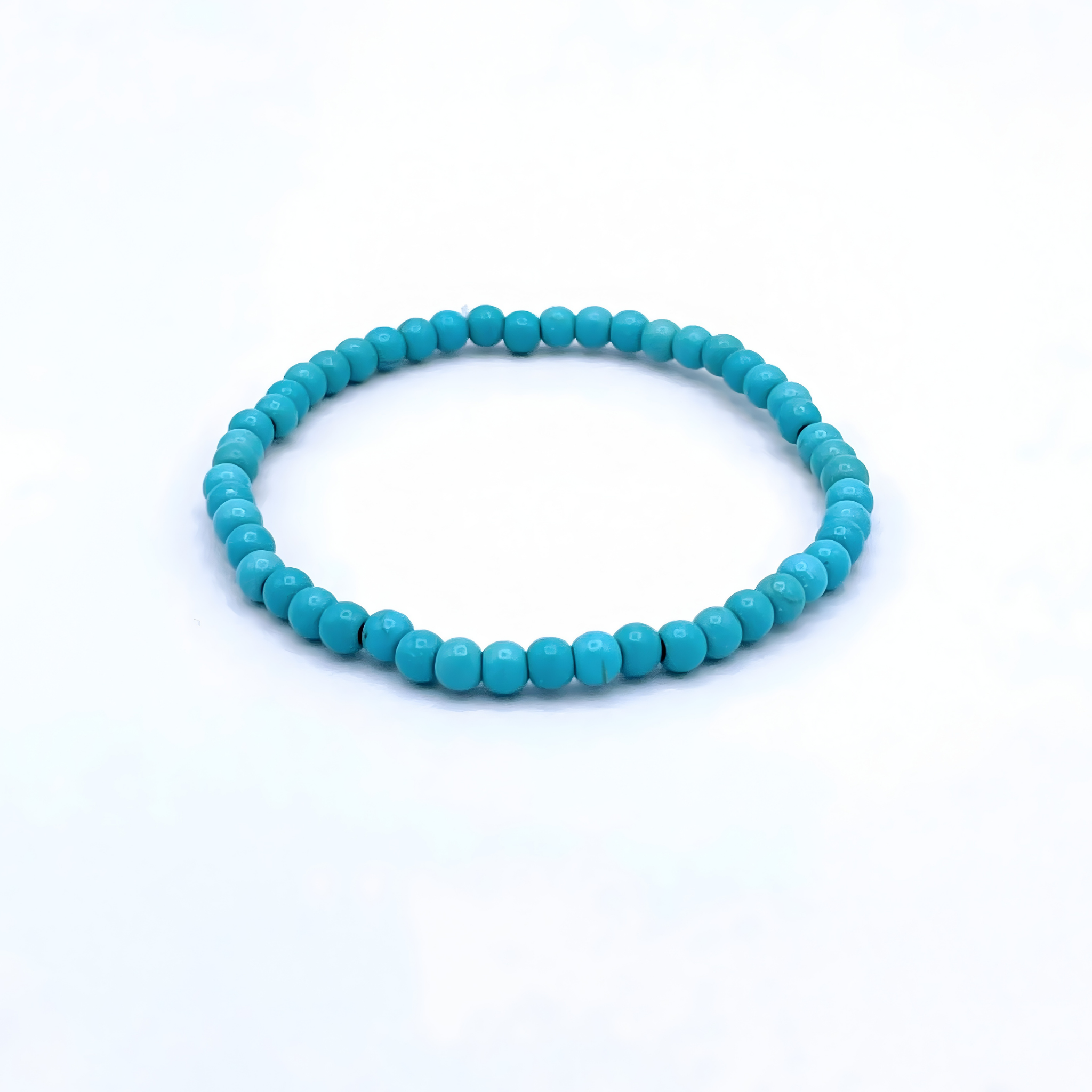Turquoise beaded bracelet on a white background