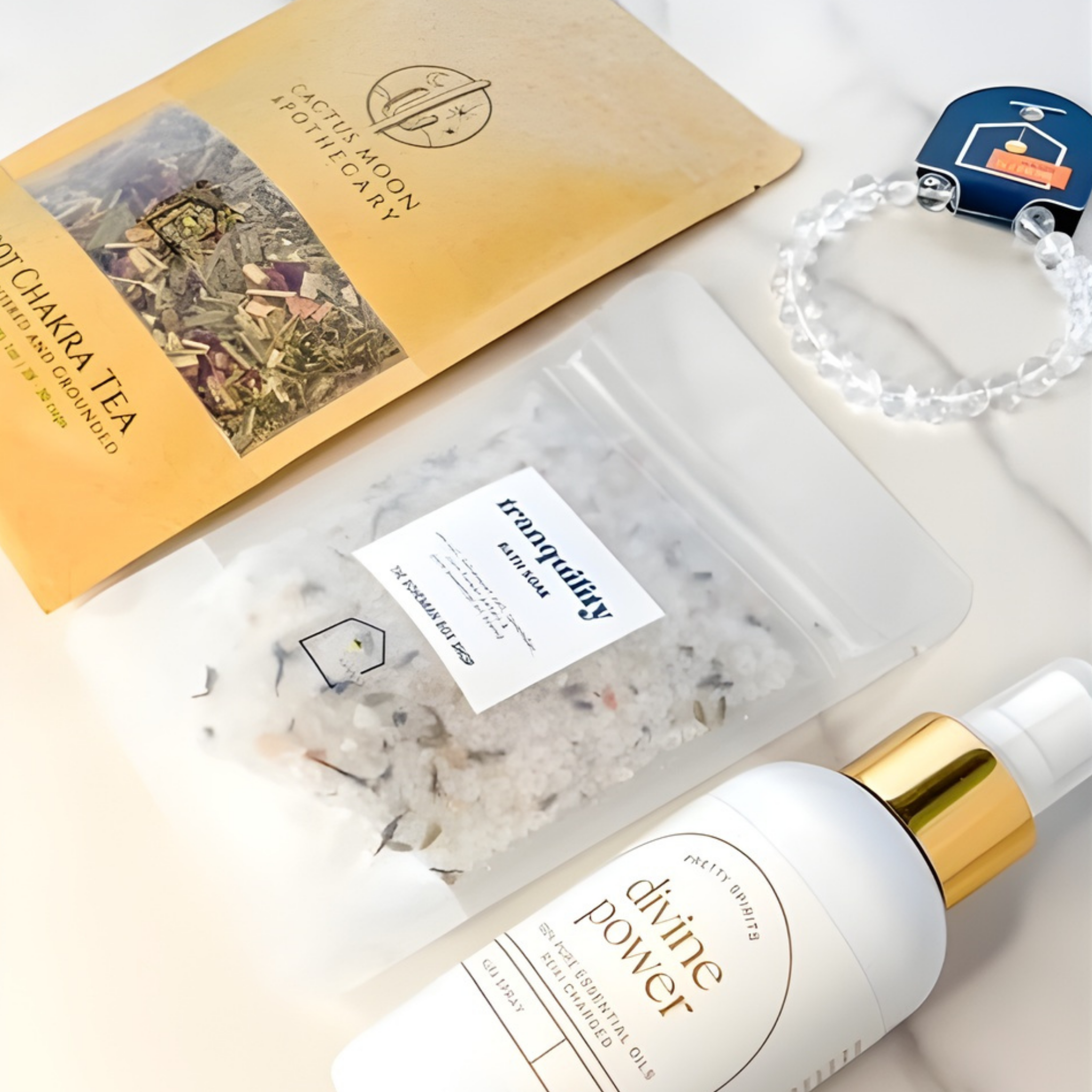 Cactus Moon Apothecary products including a bottle, tea package, and bracelet on a light background