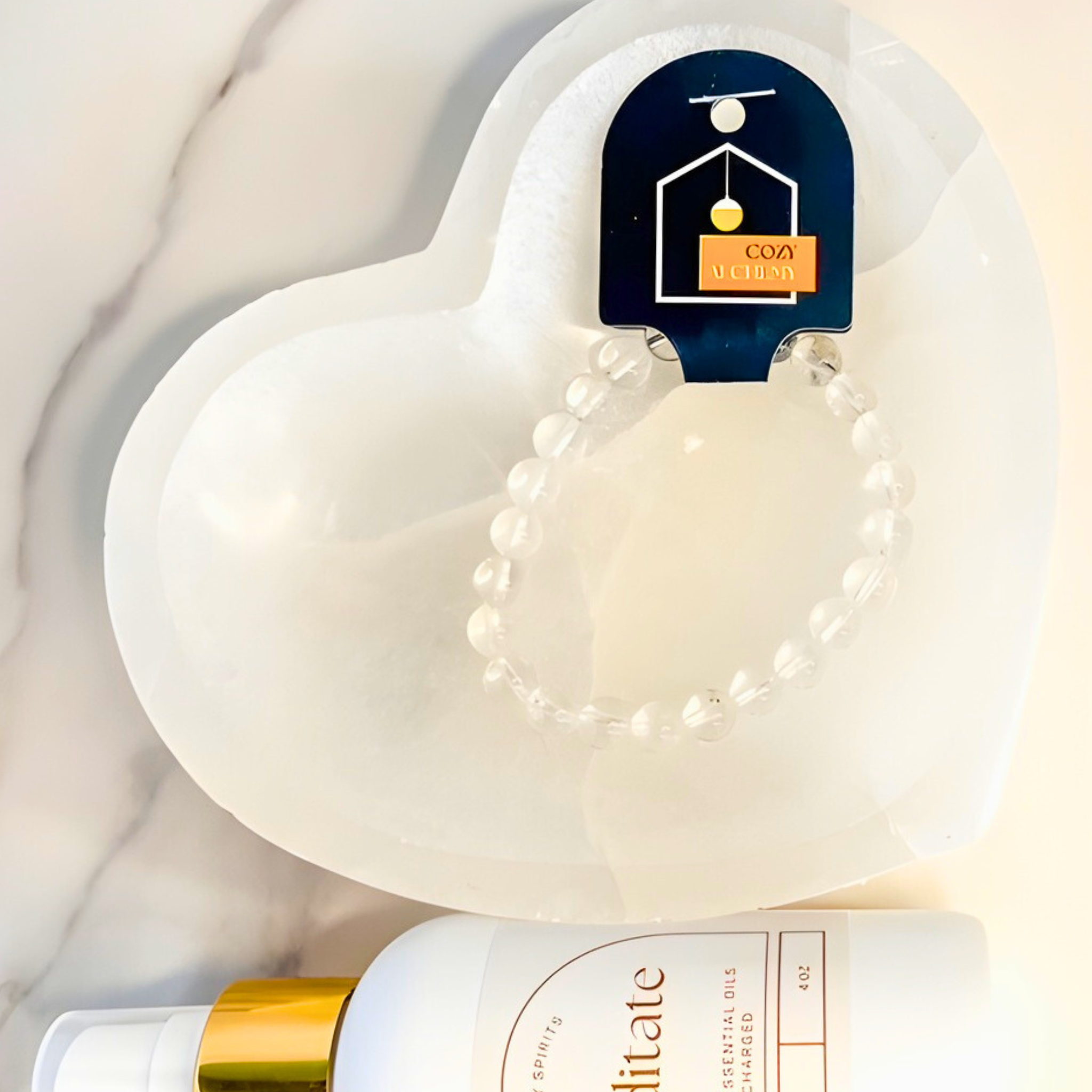 Cosmetic bottle with a pearl necklace on a soft white background