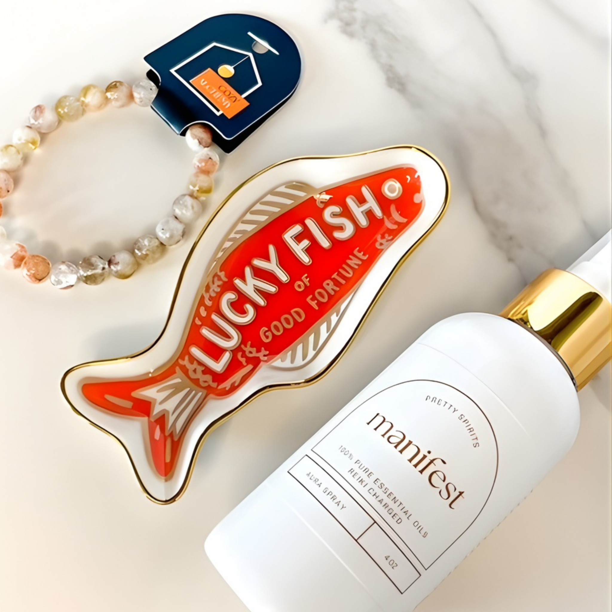 Lucky Fish product and 'manifest' bottle on a marble surface