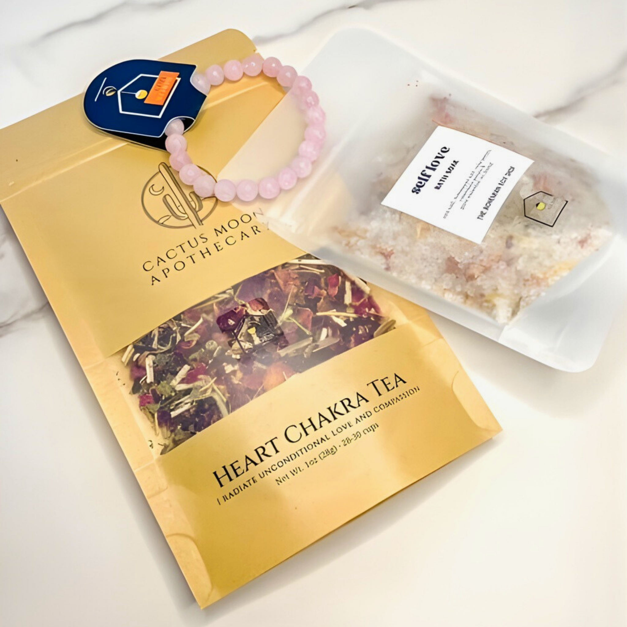 Heart Chakra tea package with a bracelet on a white surface