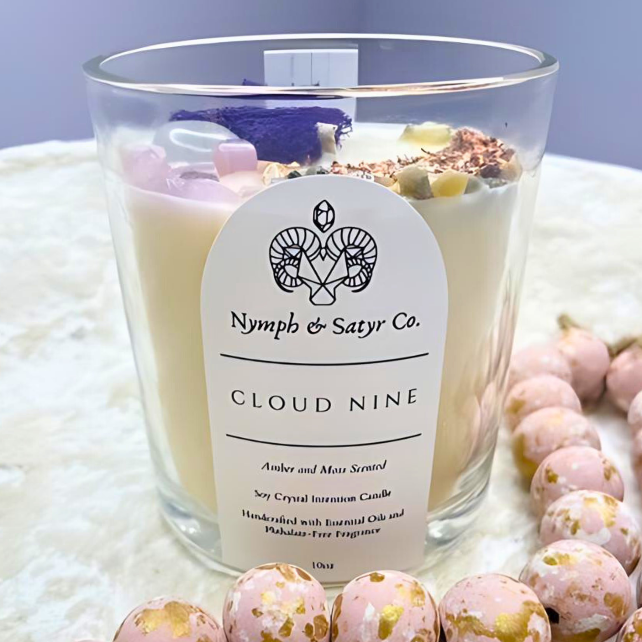 scented candle named cloud nine with crystals and sea cultures