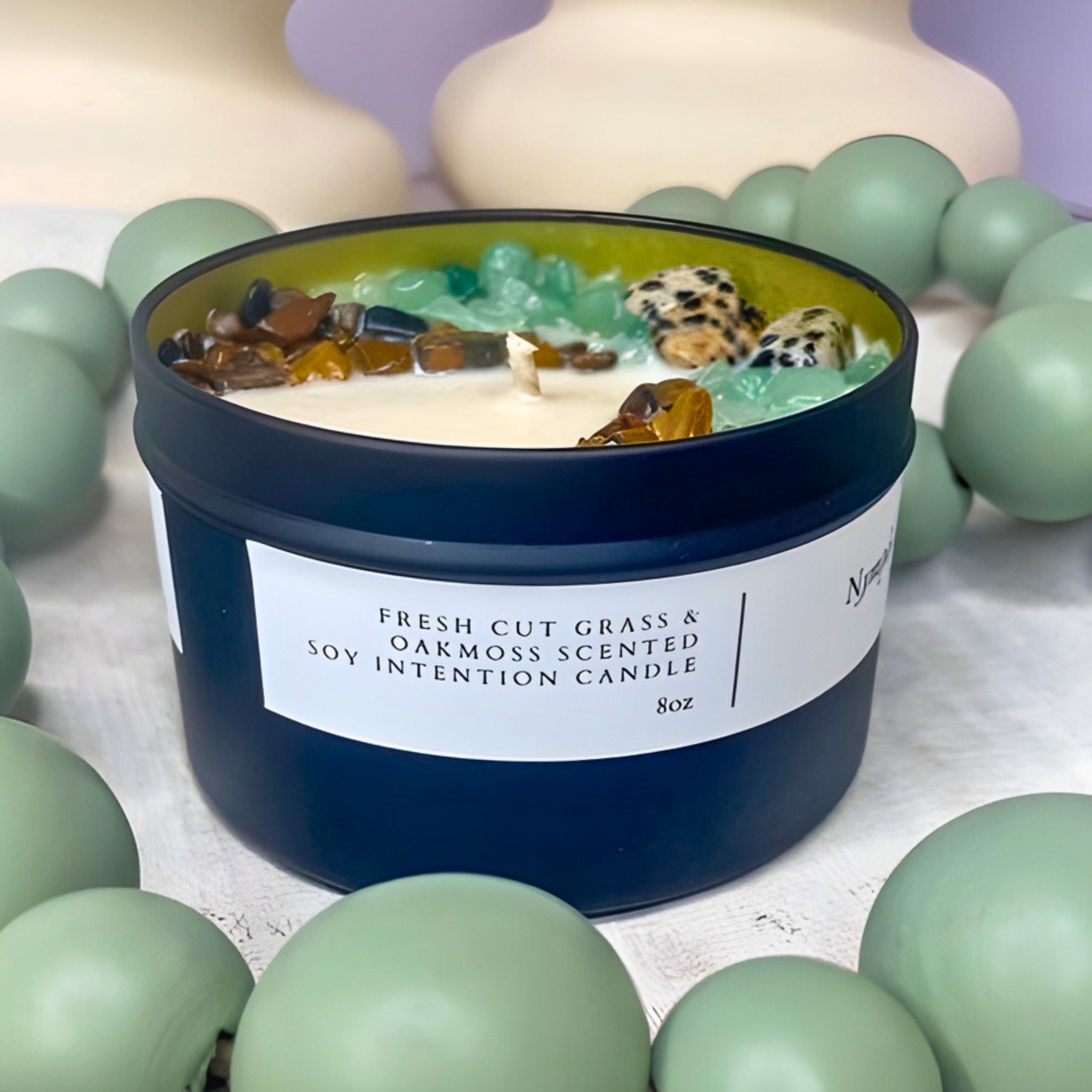 Scented candle with decorative elements on a light background