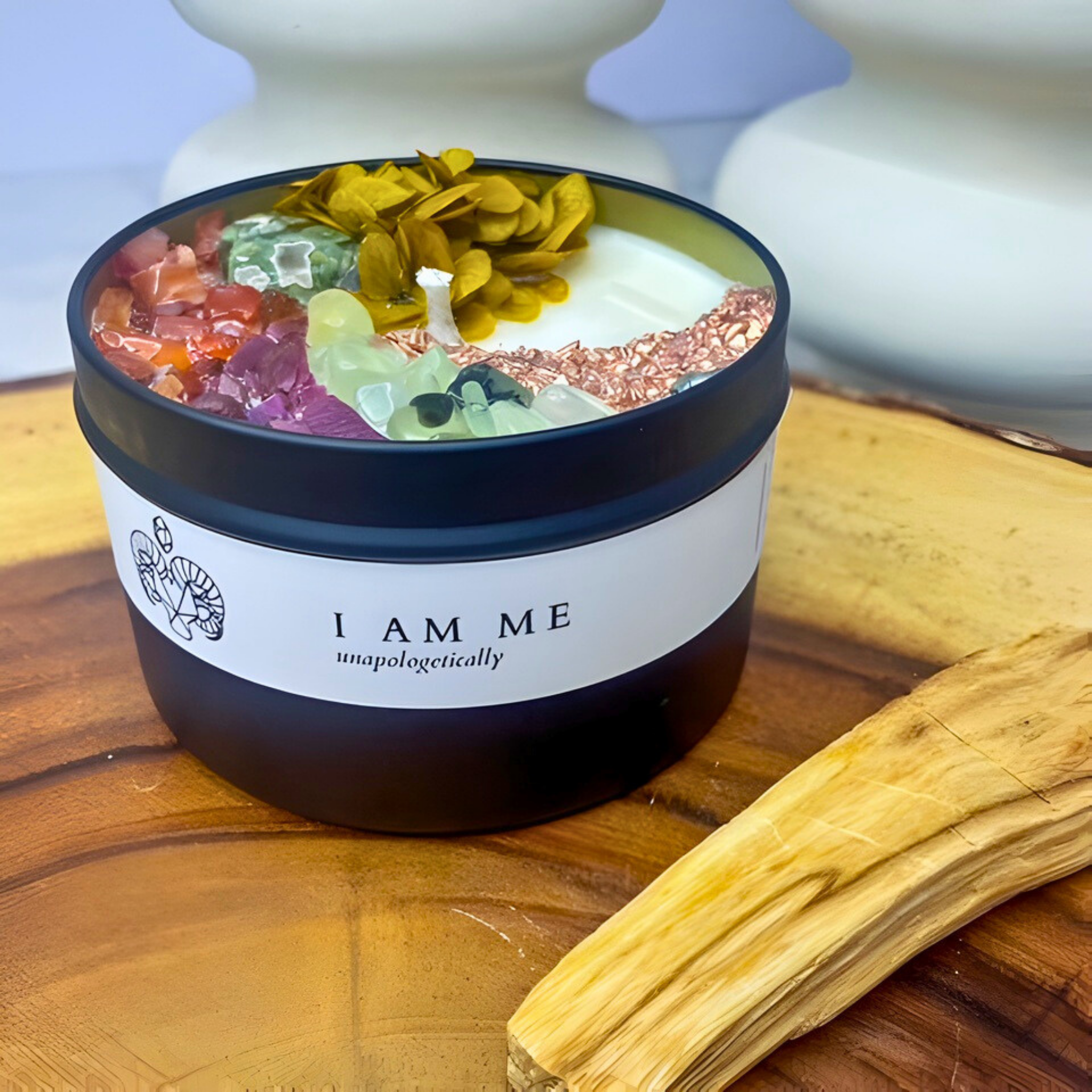Jar of colorful bath salts with 'I AM ME' branding on a wooden surface.