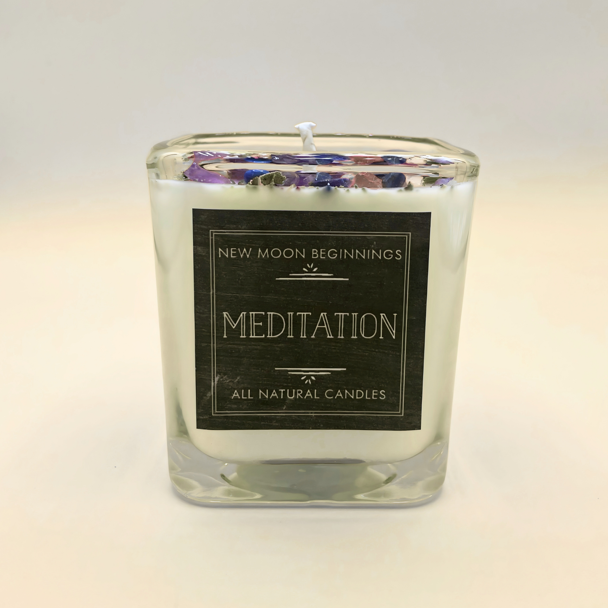 All natural candles labeled 'Meditation' by 'New Moon Beginnings' on a white background