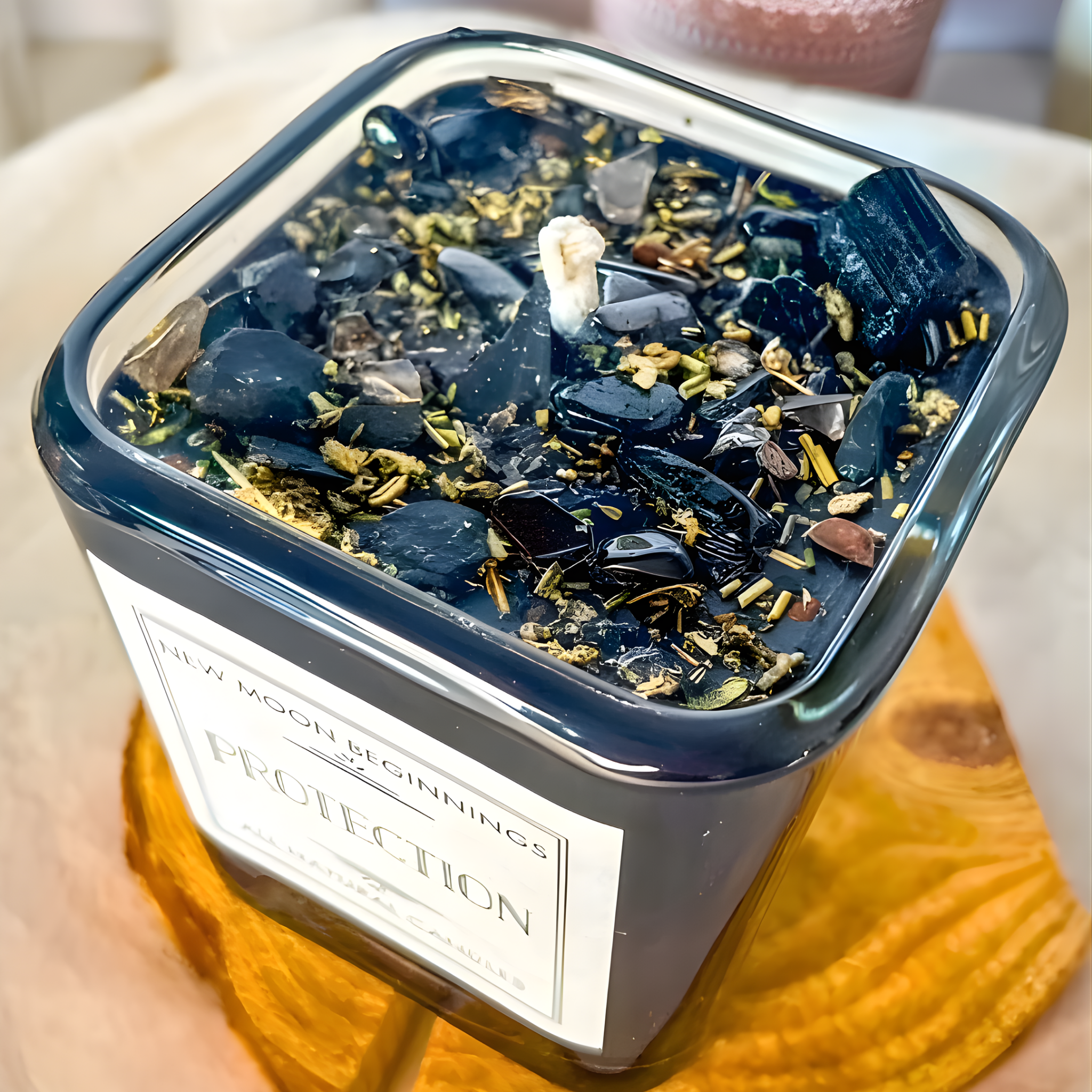 Container of decorative stones with a label on a wooden surface