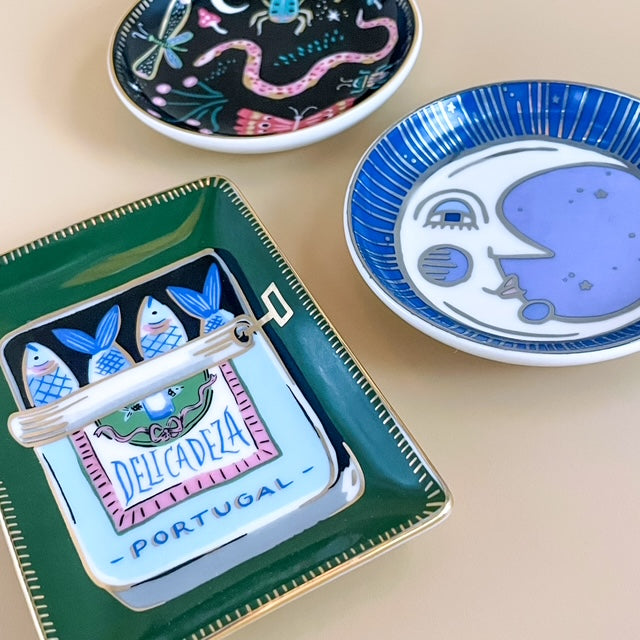 Decorative plates with various designs on a beige surface