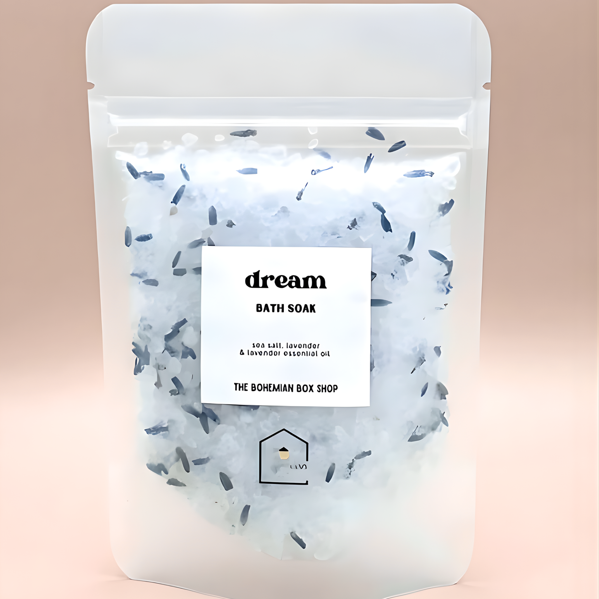 Packaged bath soap with lavender and rose petals on a pink background