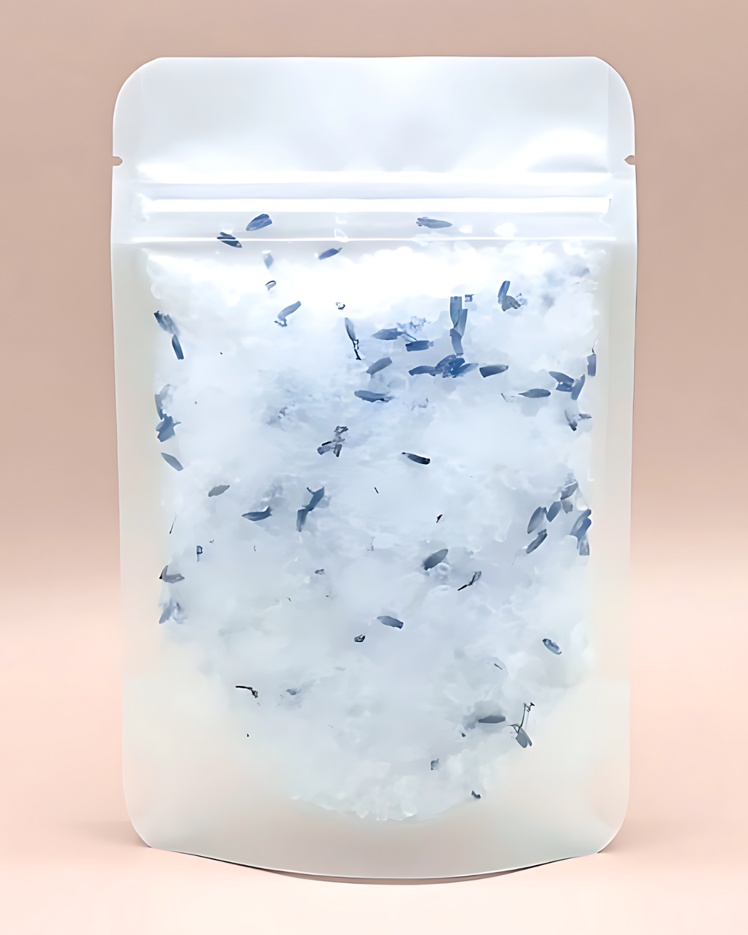 White packaging with blue and black specks on a beige background