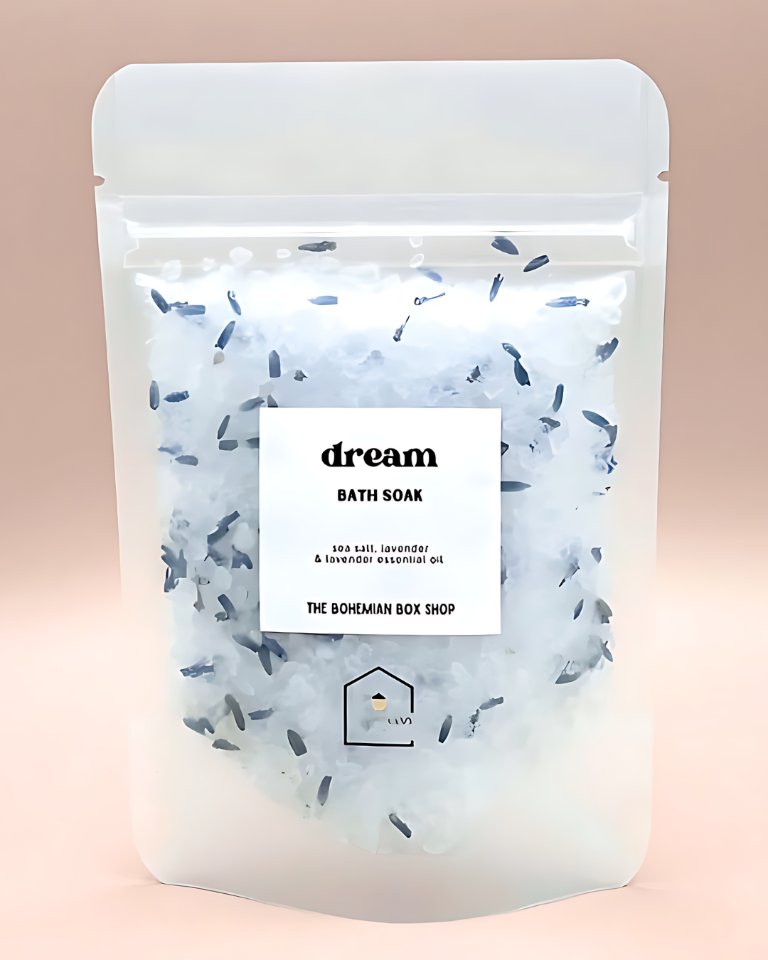 Bath soak packaging with a label on a pink background