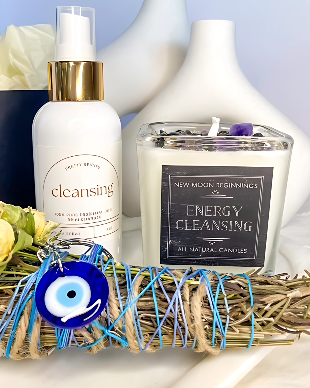 Cleansing products including a bottle, candle, and amulet on a white surface with a blue background.