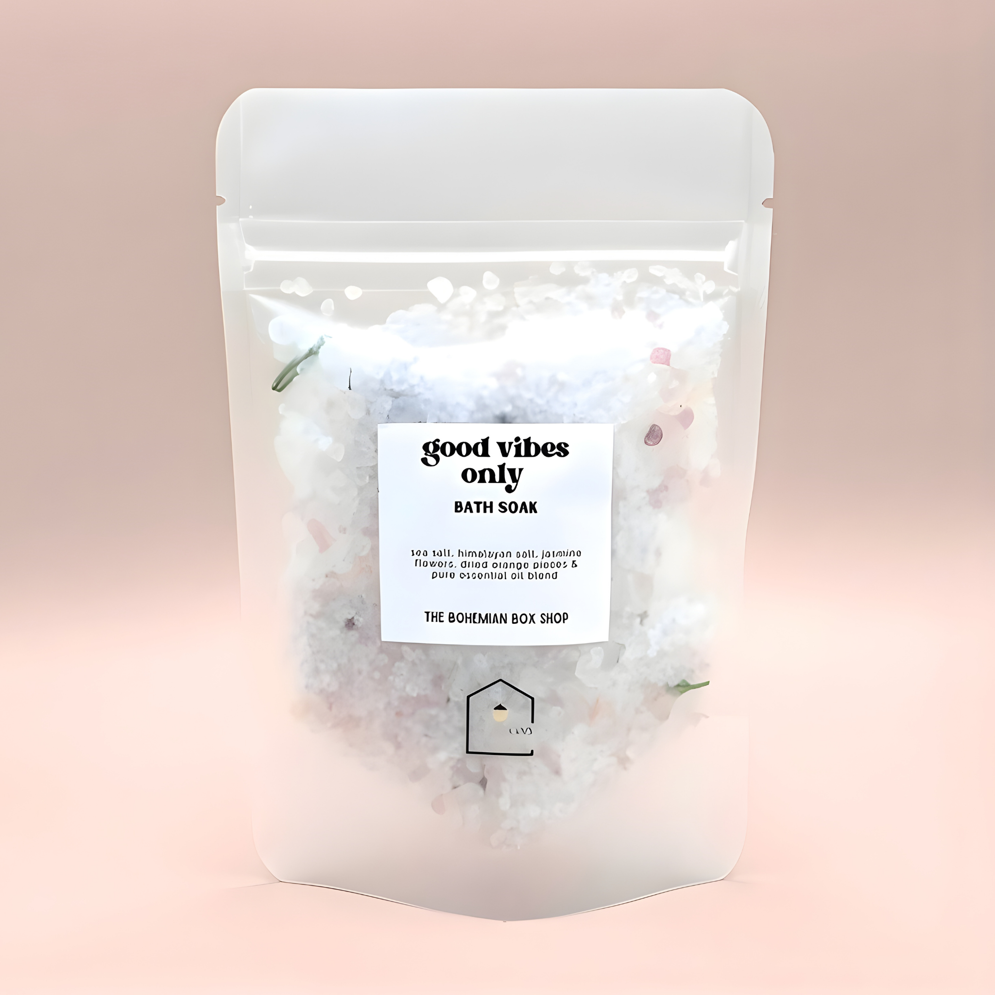Bath salt package with 'good vibes only' label on a pink background
