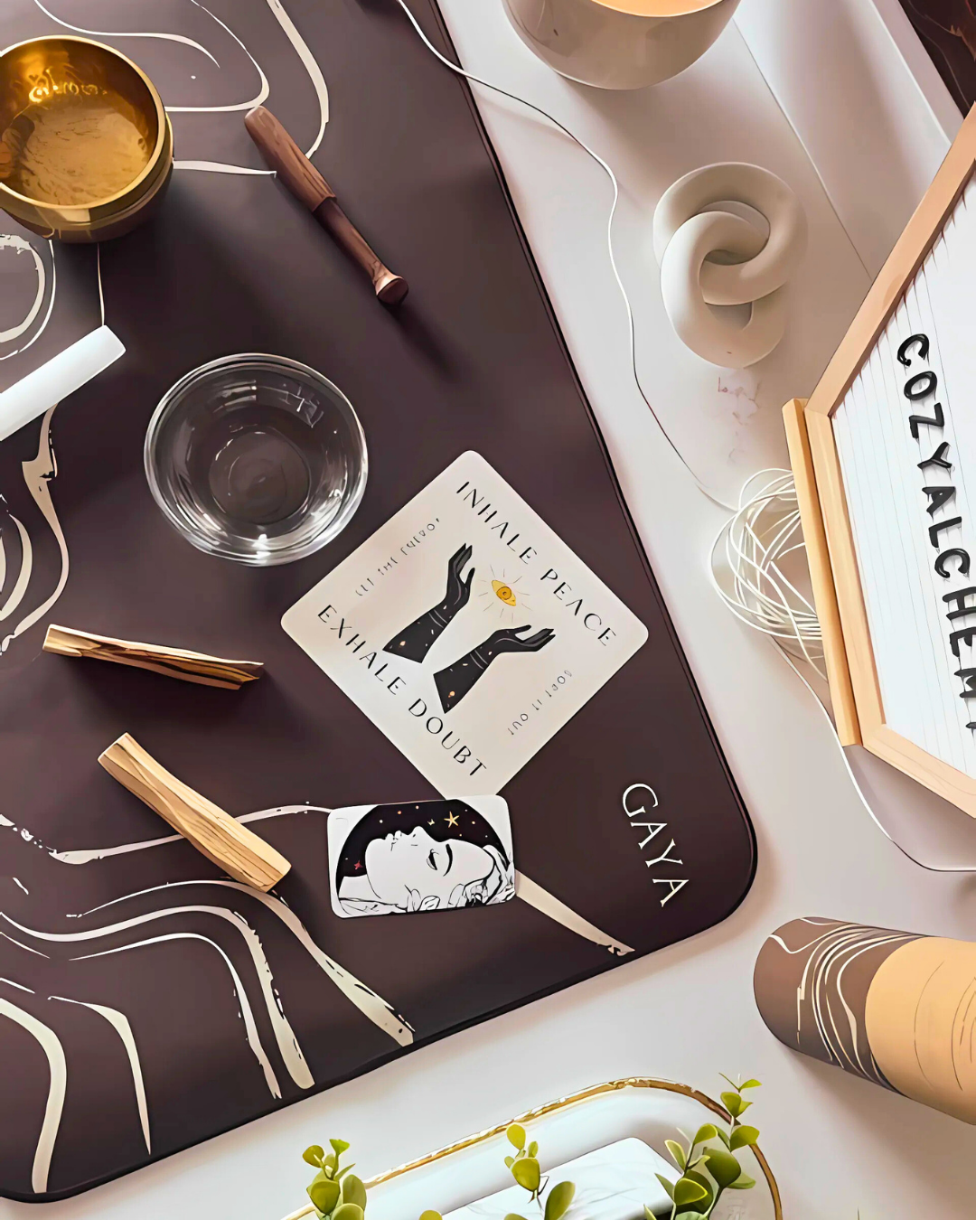 Gaya product on a decorative surface with candles and decor items