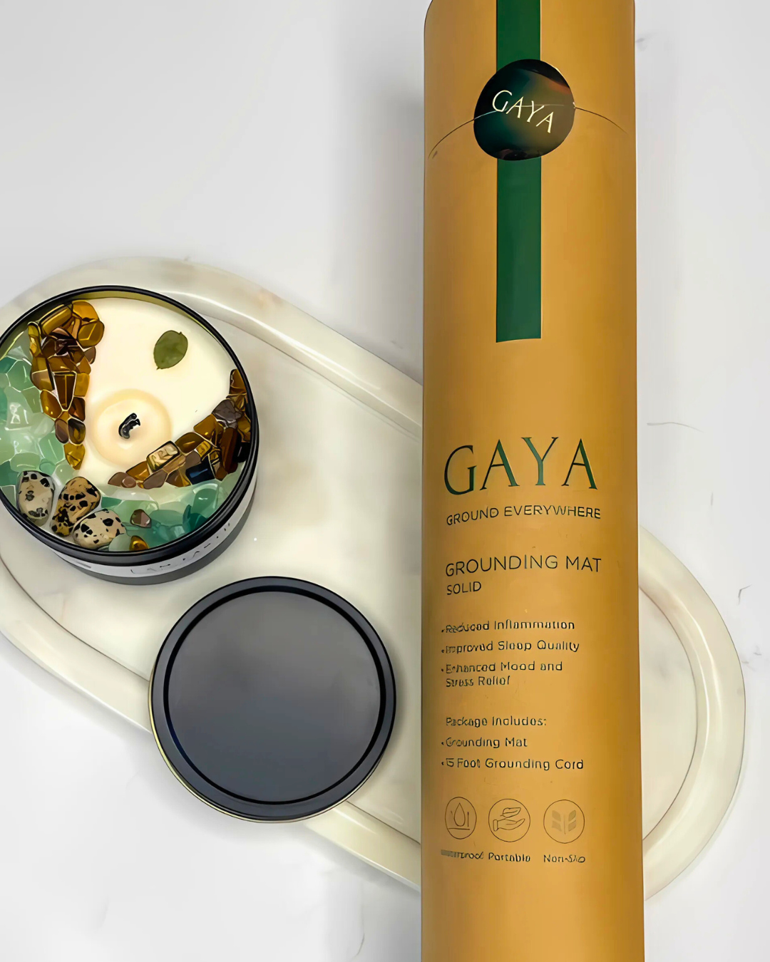 Gaya grounding mat and candle on a white background