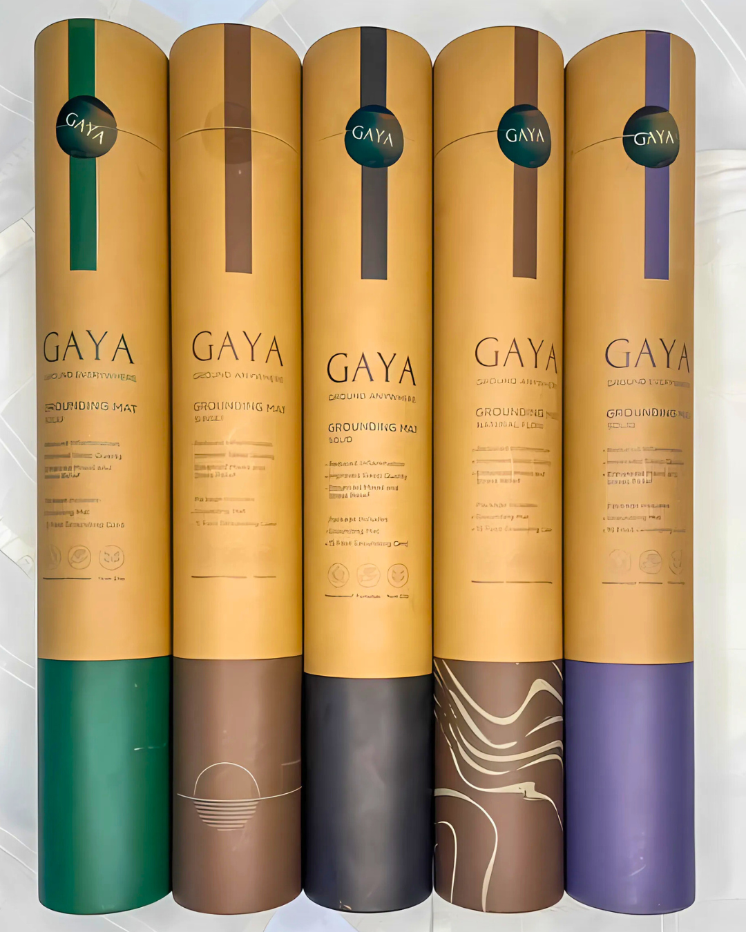 Five GAYA hair care product tubes with different color schemes on a white background