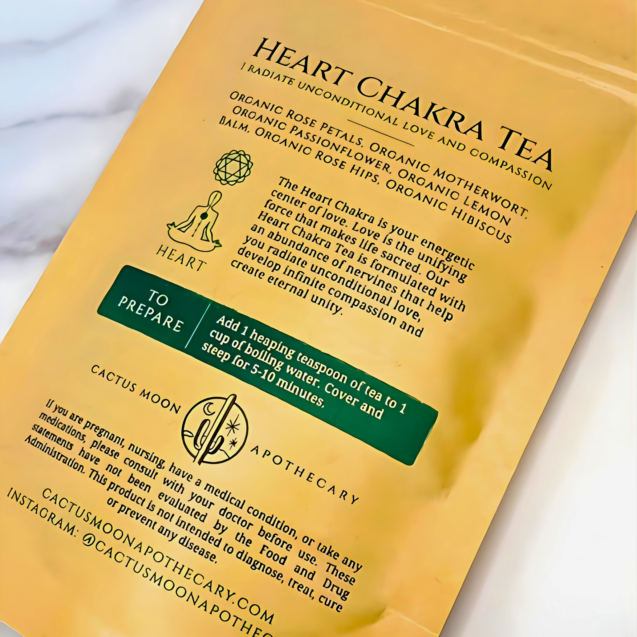 Heart Chakra Tea package with text and branding on a white background