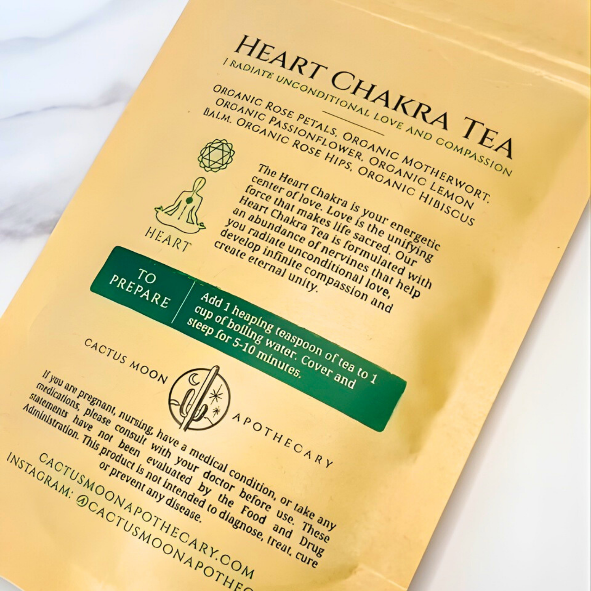 Heart Chakra Tea package with text and branding on a light background