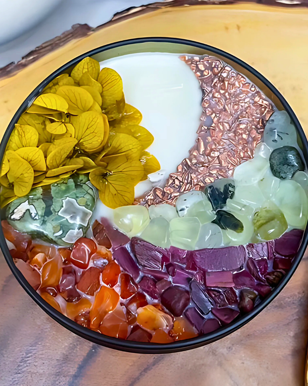 Colorful dessert with flowers and various textures on a wooden surface