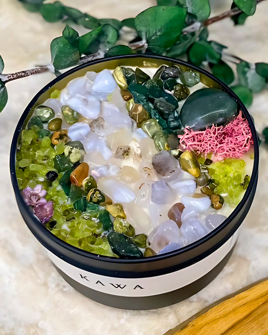 Decorative container with pebbles and stones on a neutral background
