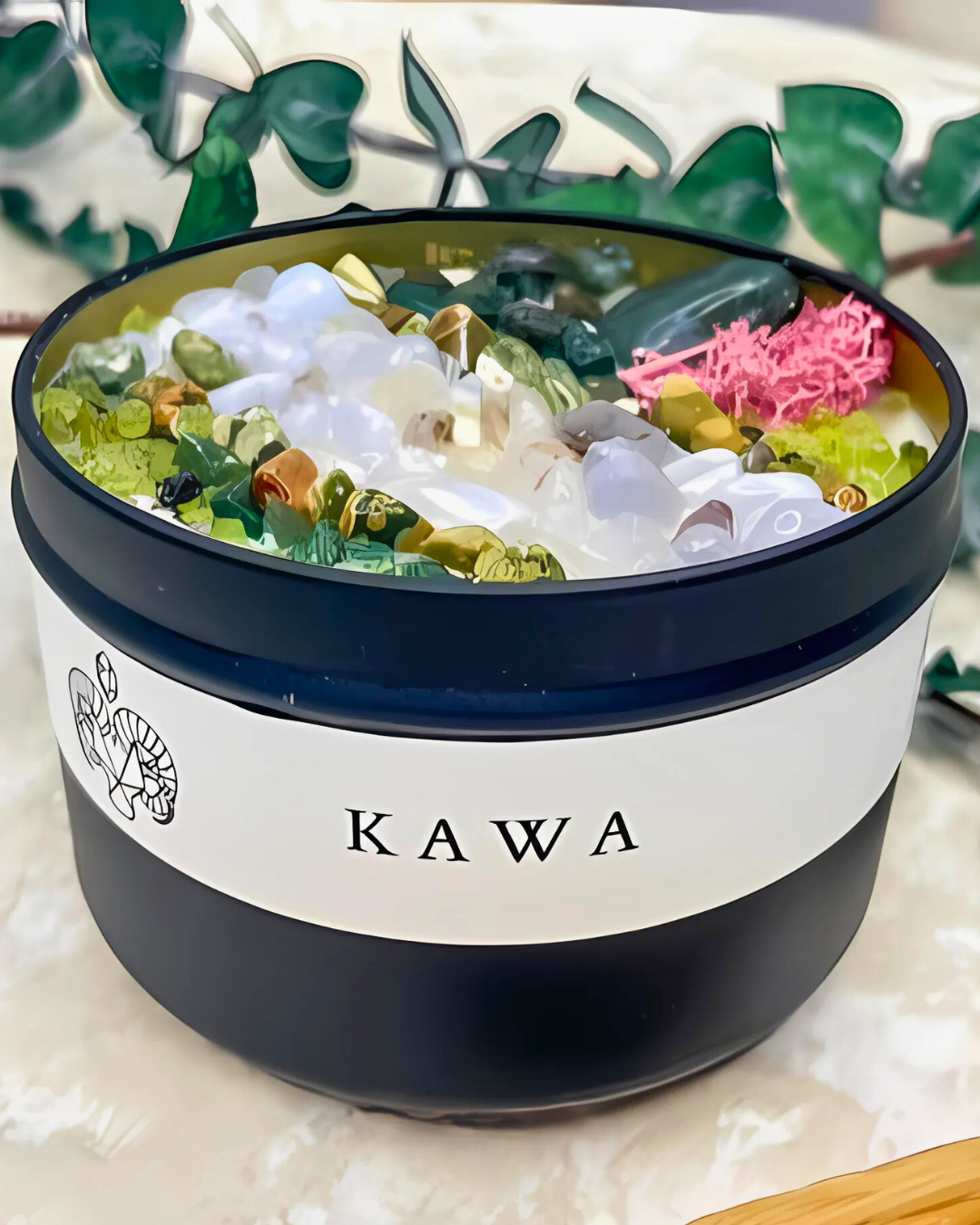 Bowl of dessert with 'Kawa' branding on a decorative background