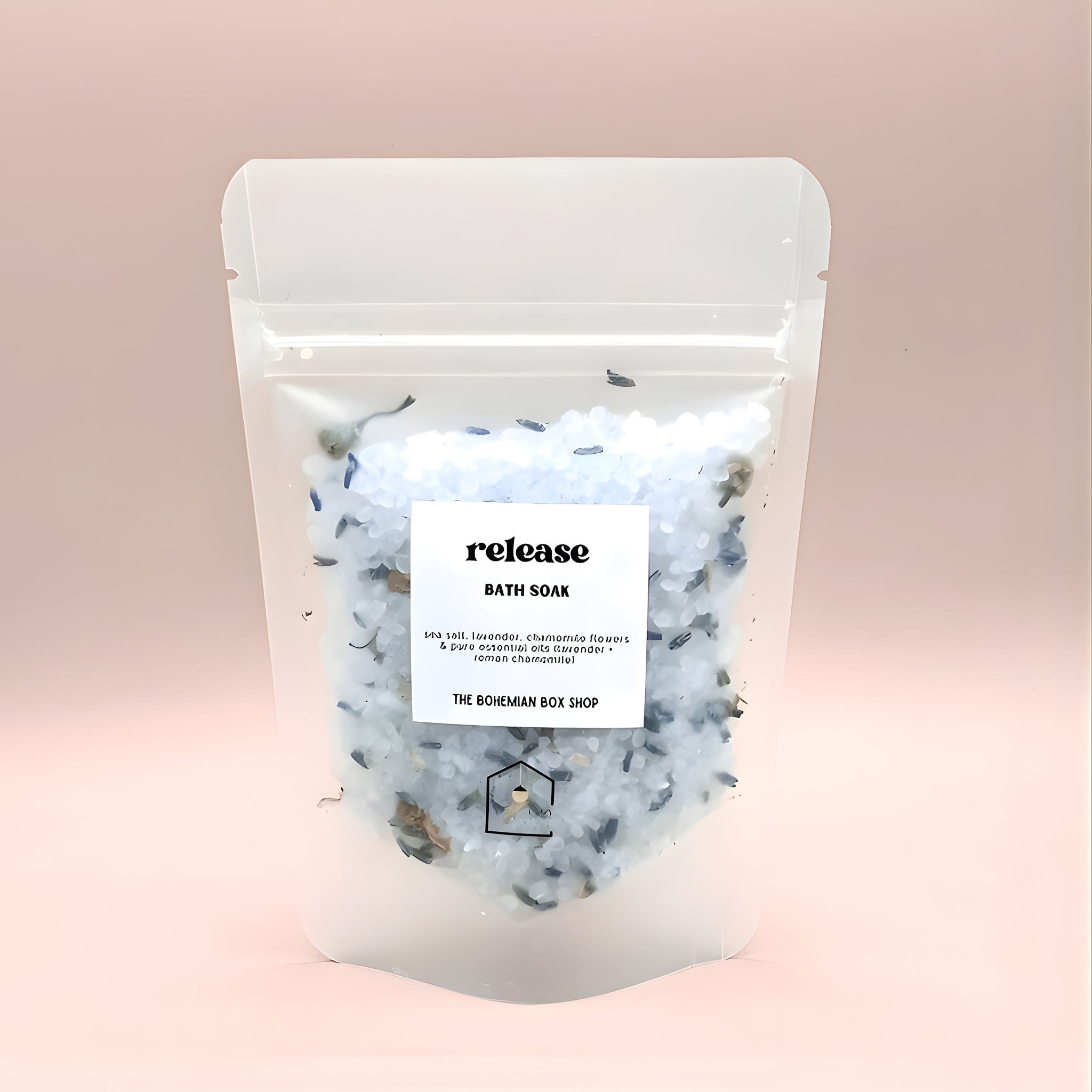 Bath salt package with 'release' label on a pink background