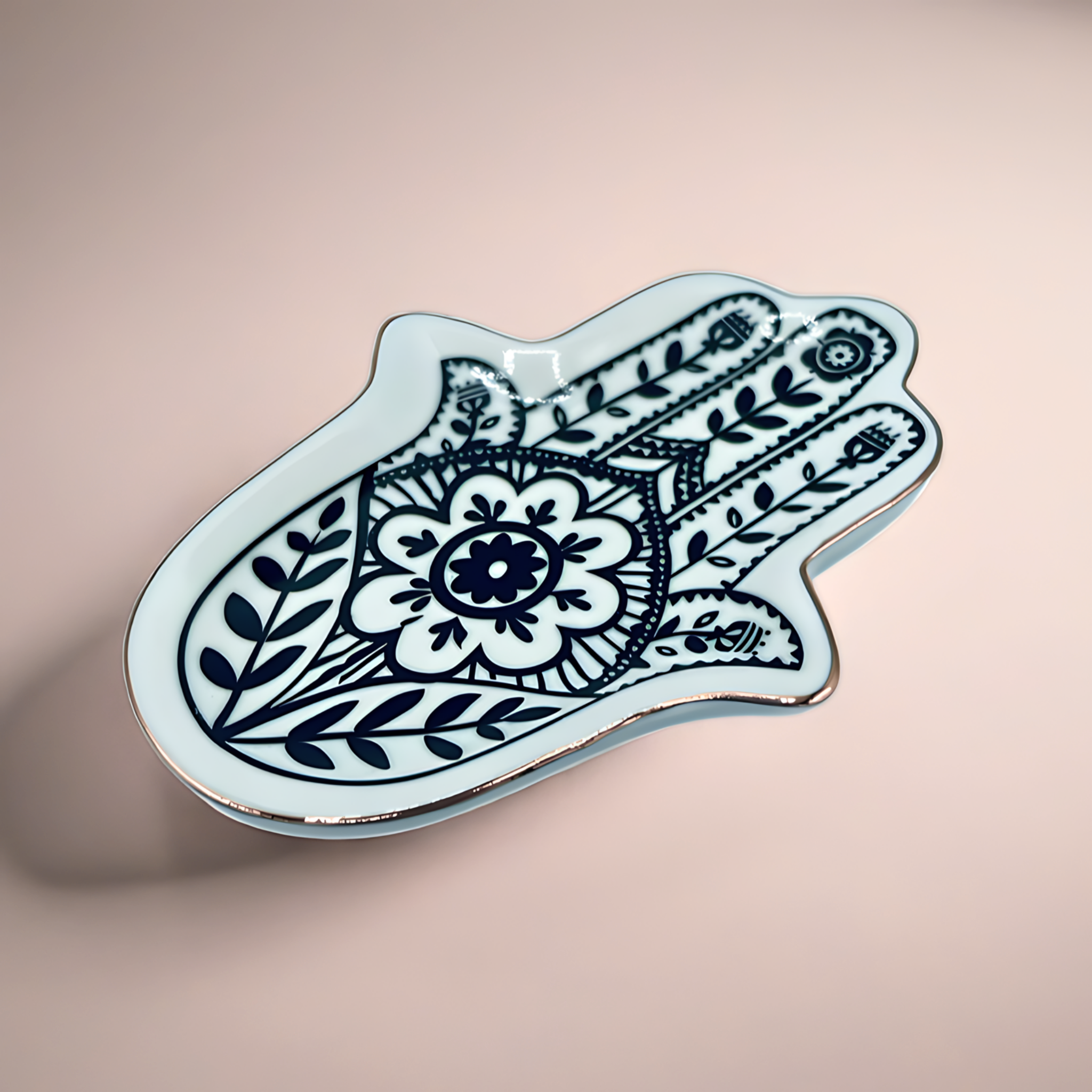 Decorative Hamsa hand plate with intricate black patterns on a beige background