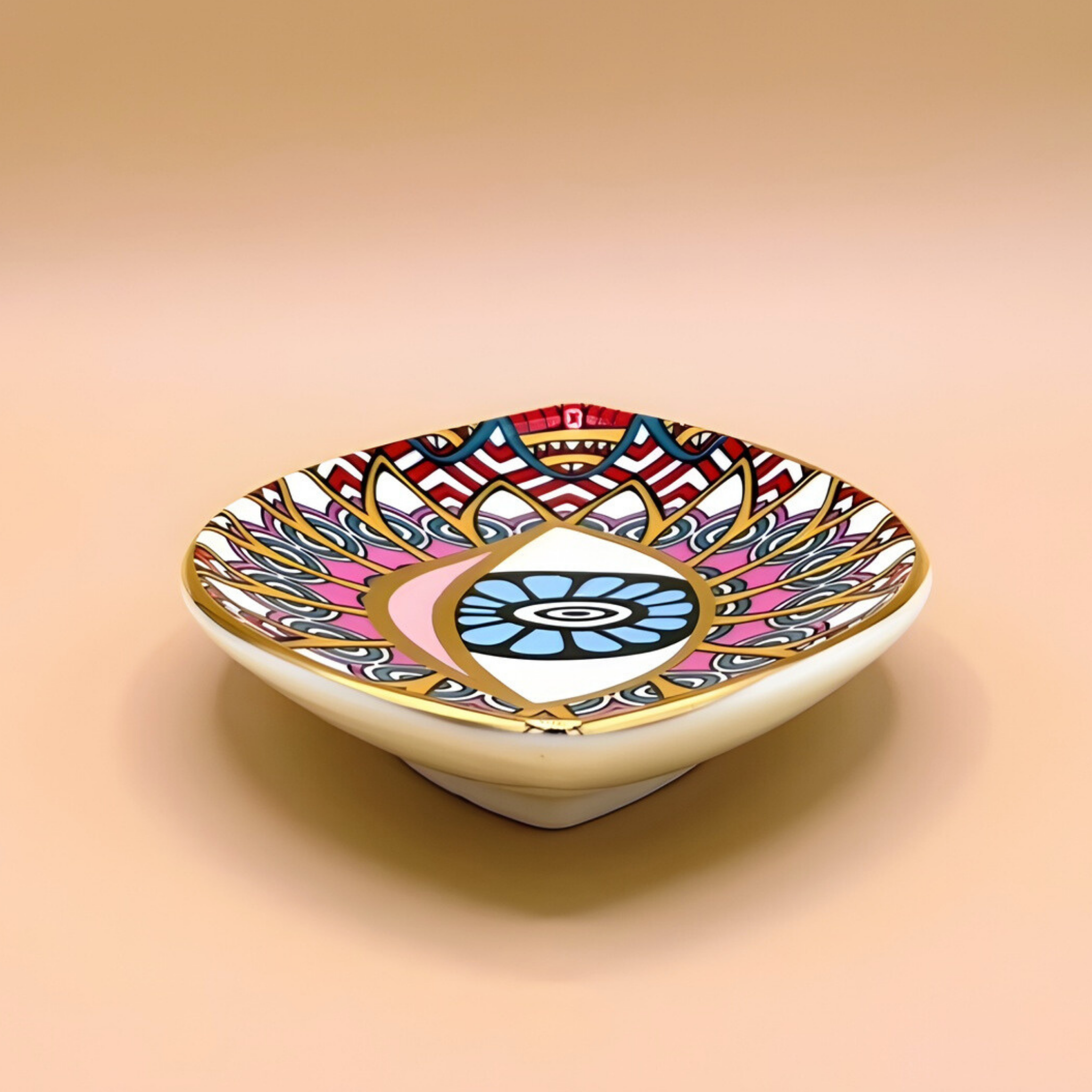 Decorative ceramic plate with colorful mandala design on a beige background