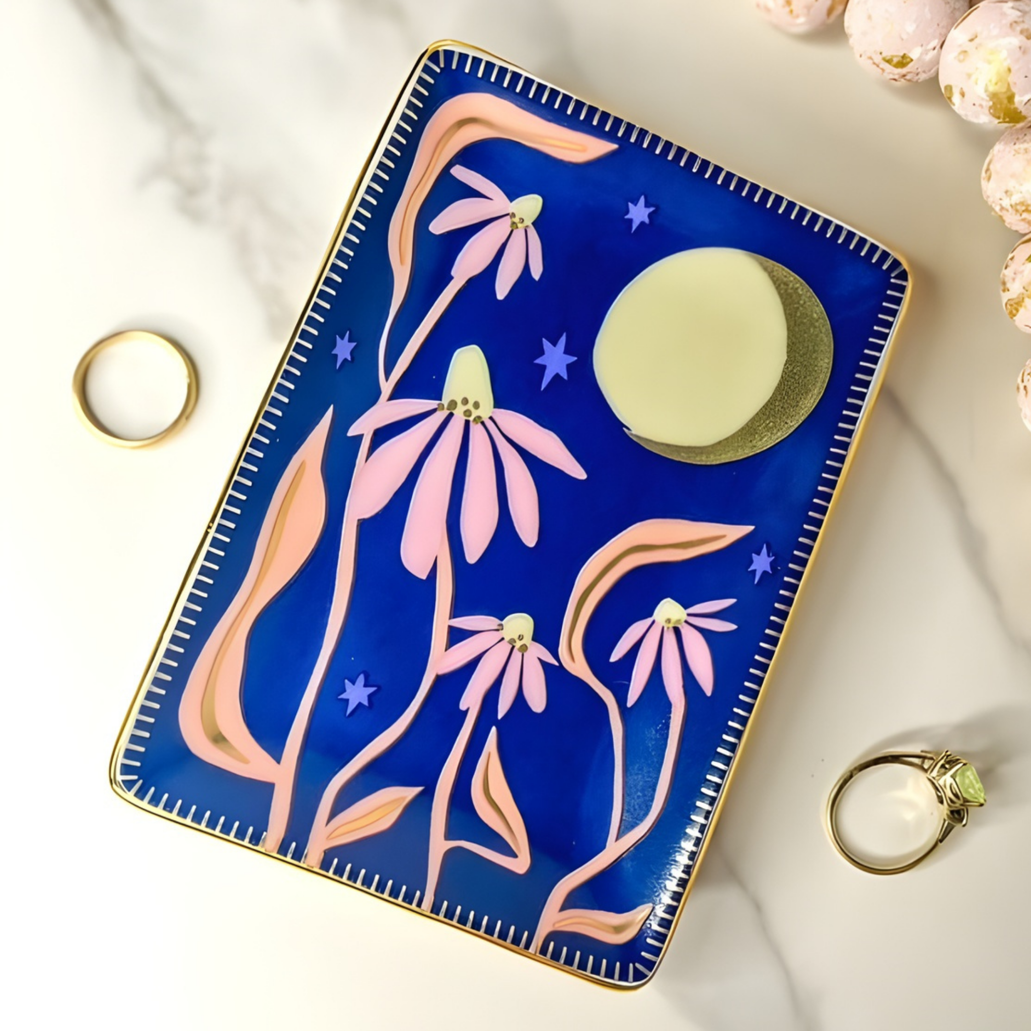 Decorative tray with floral design on a white surface