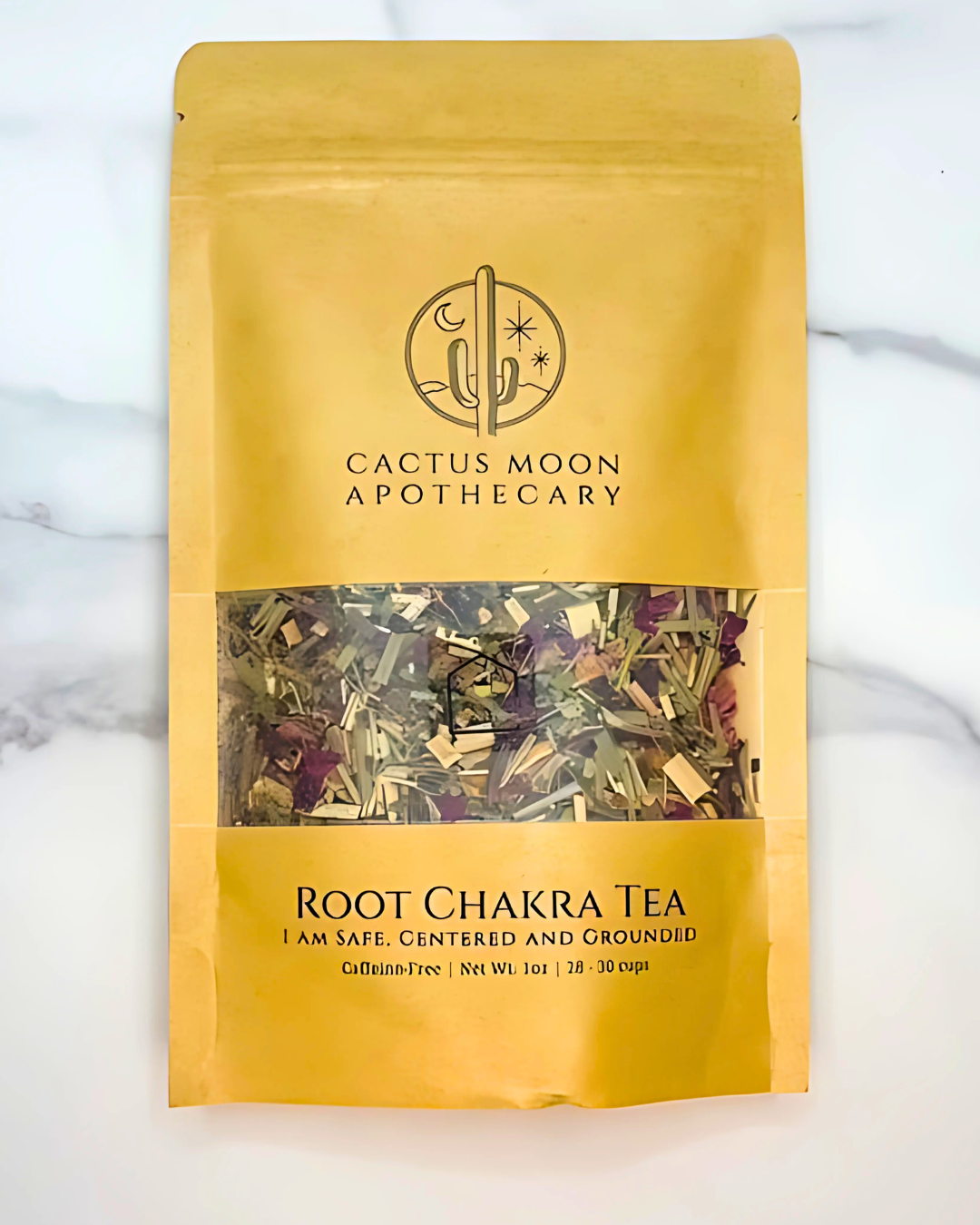 Yellow package of Root Chakra Tea from Cactus Moon Apothecary on a white background