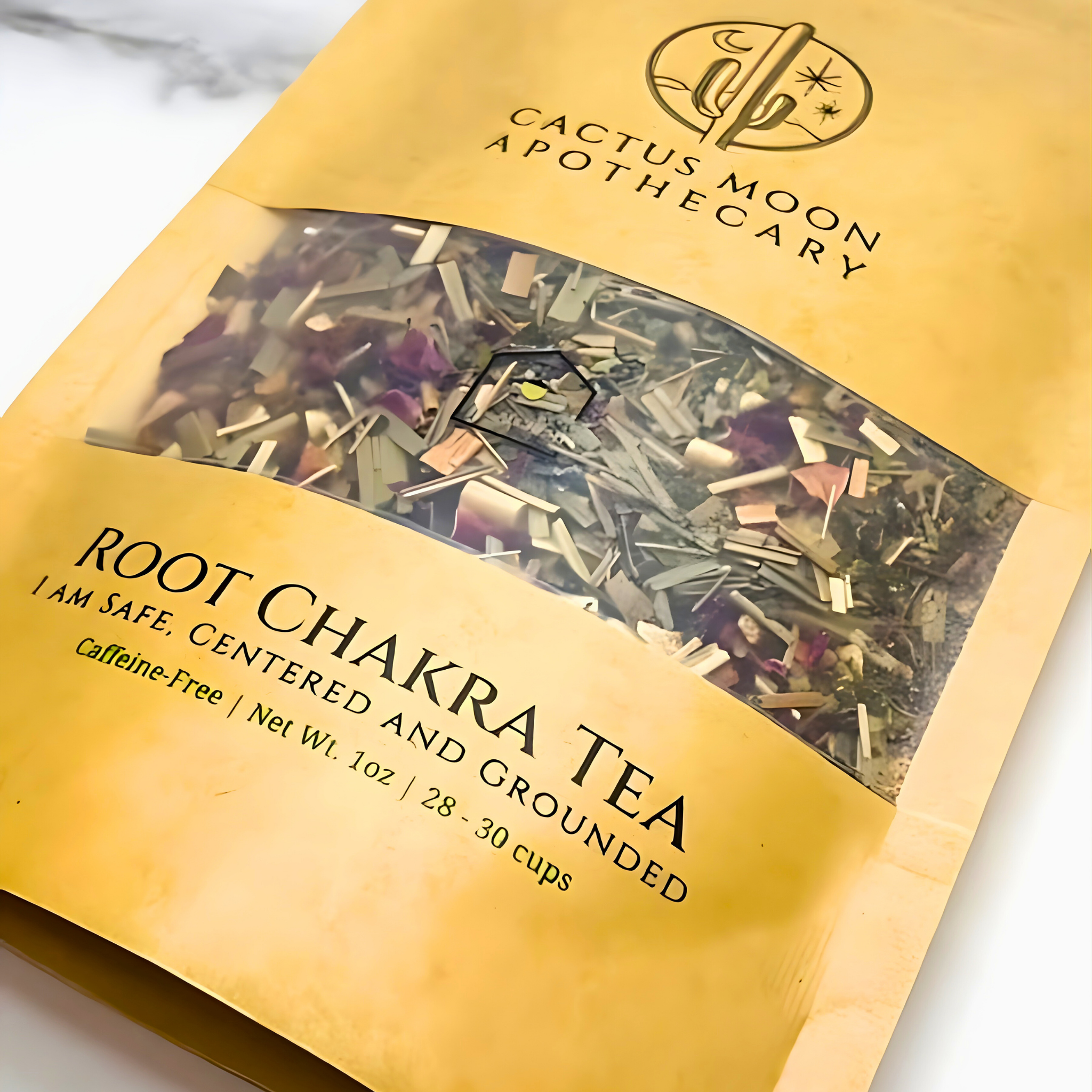 Cactus Moon Apothecary Root Chakra Tea package on a marble surface