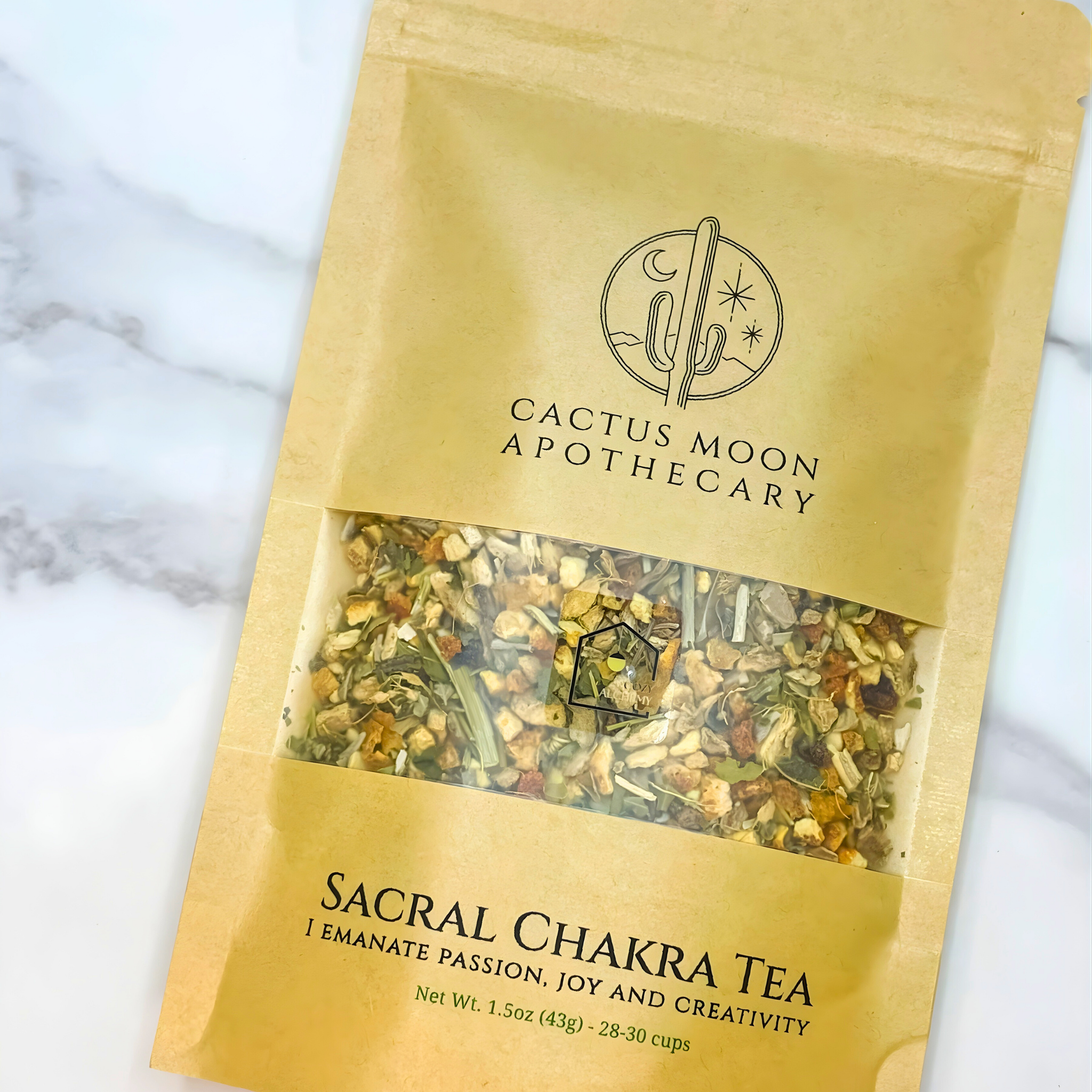 Bag of Sacral Chakra Tea from Cactus Moon Apothecary on a marble surface