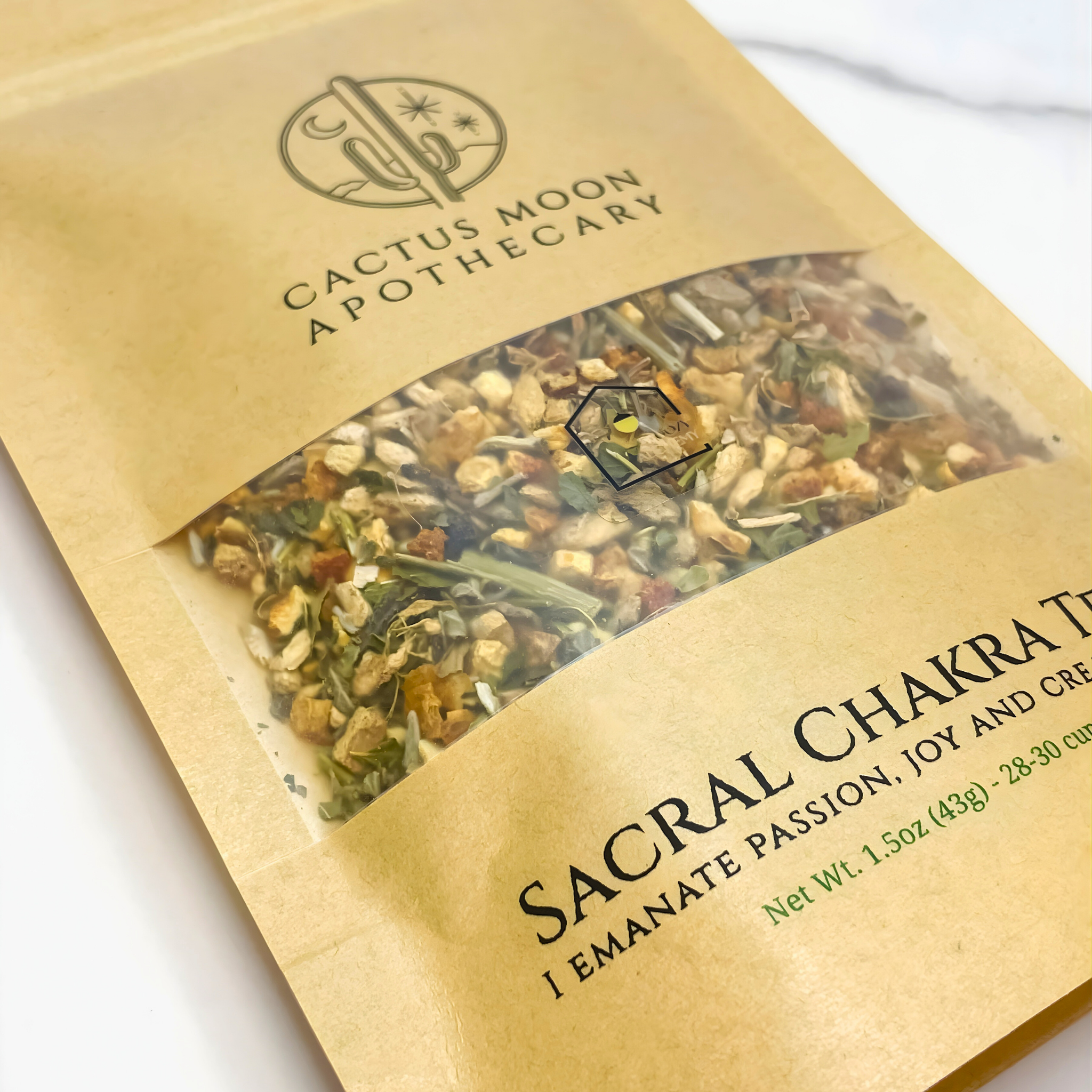 Herbal mix packaging with 'Cactus Moon Apothecary' branding on a white background