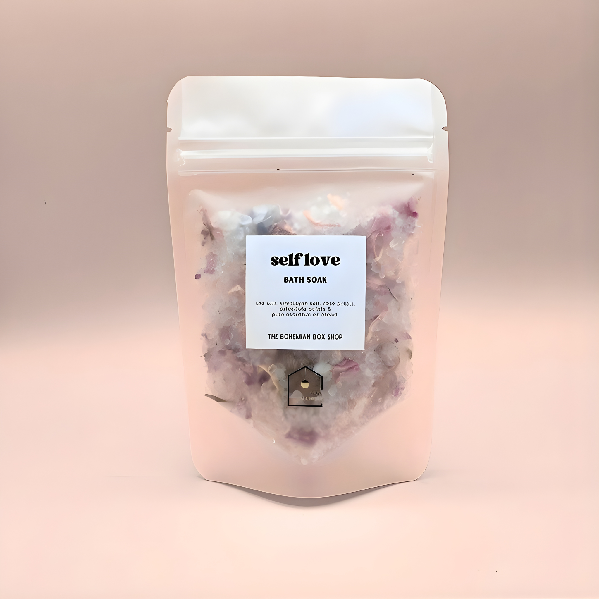 Bath soap package with 'self love' label on a pink background