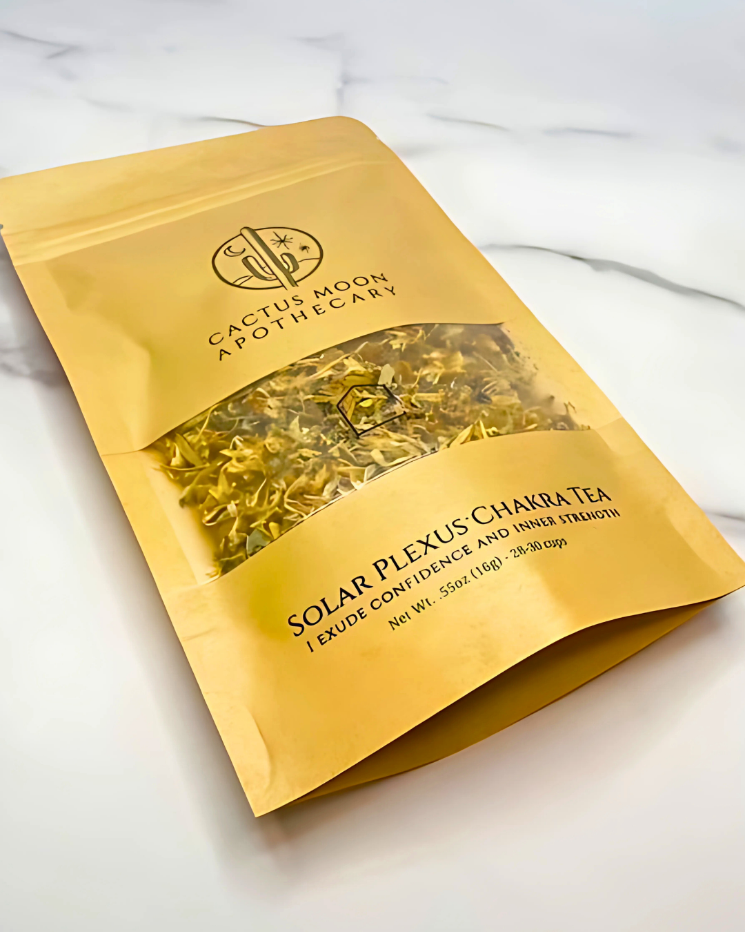 Yellow package of Solar Plexus Chakra Tea from Cactus Moon Apothecary on a white background