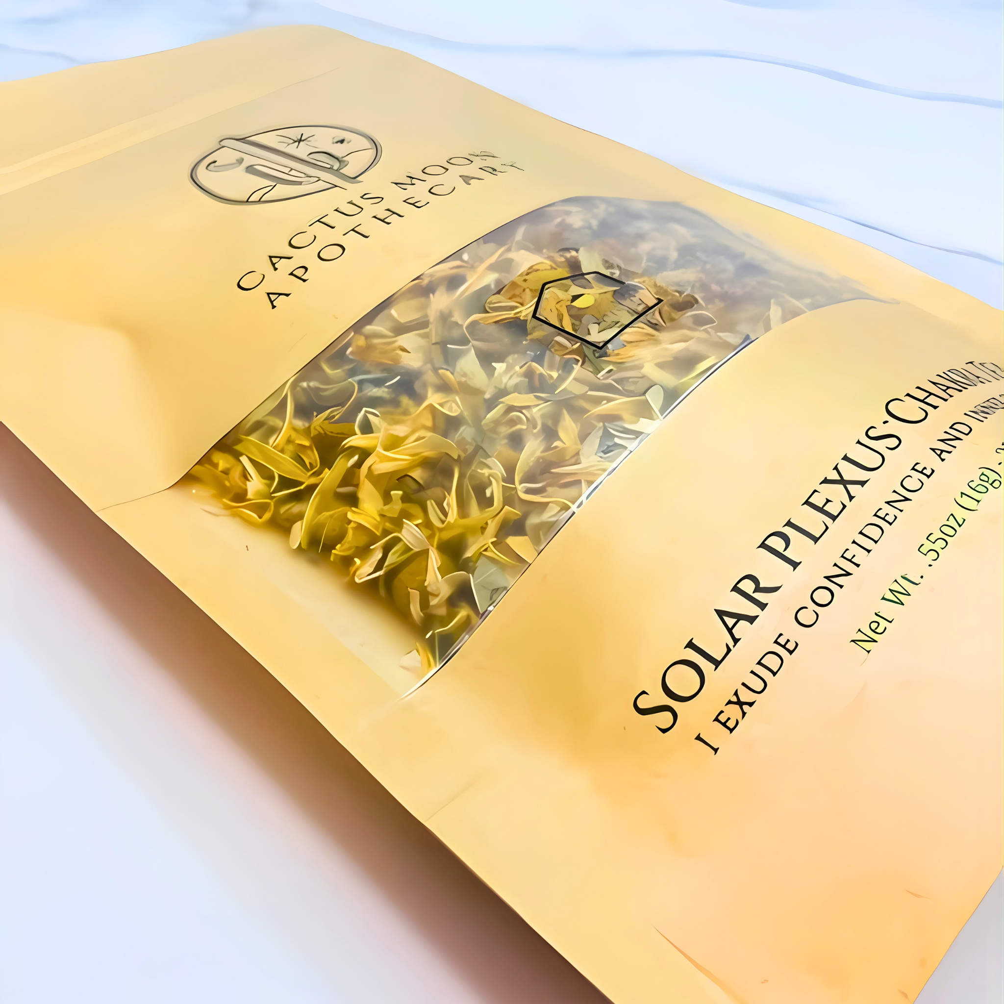 Cactus Moon Apothecary solar plexus chakra product packaging on a light background