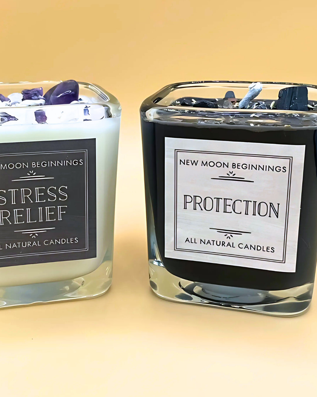 Two glass candles with labels 'Stress Relief' and 'Protection' on a beige background.