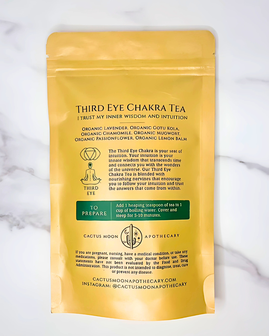 Yellow package of Third Eye Chakra Tea with text on a white background