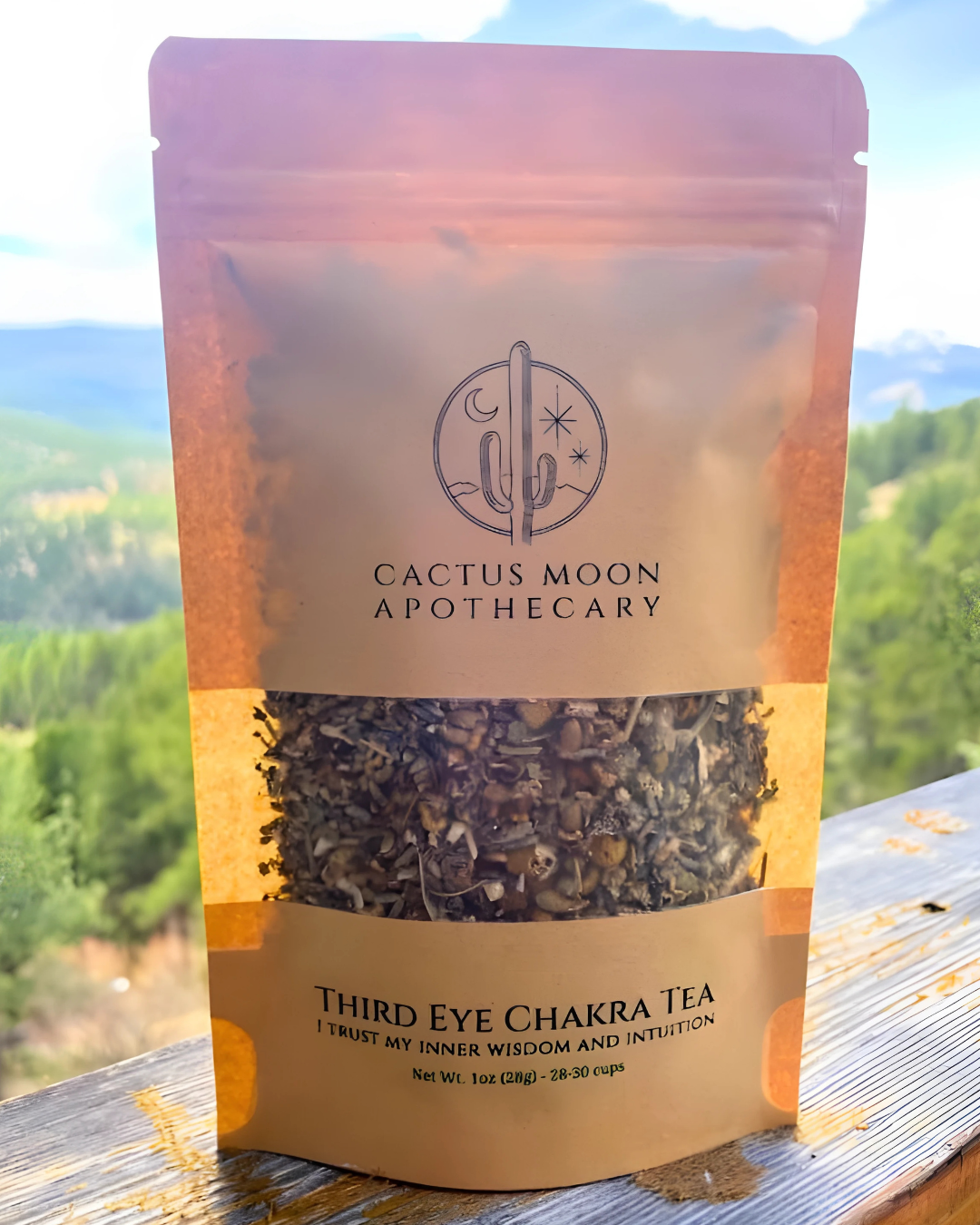 Cactus Moon Apothecary Third Eye Chakra Tea package with a scenic background