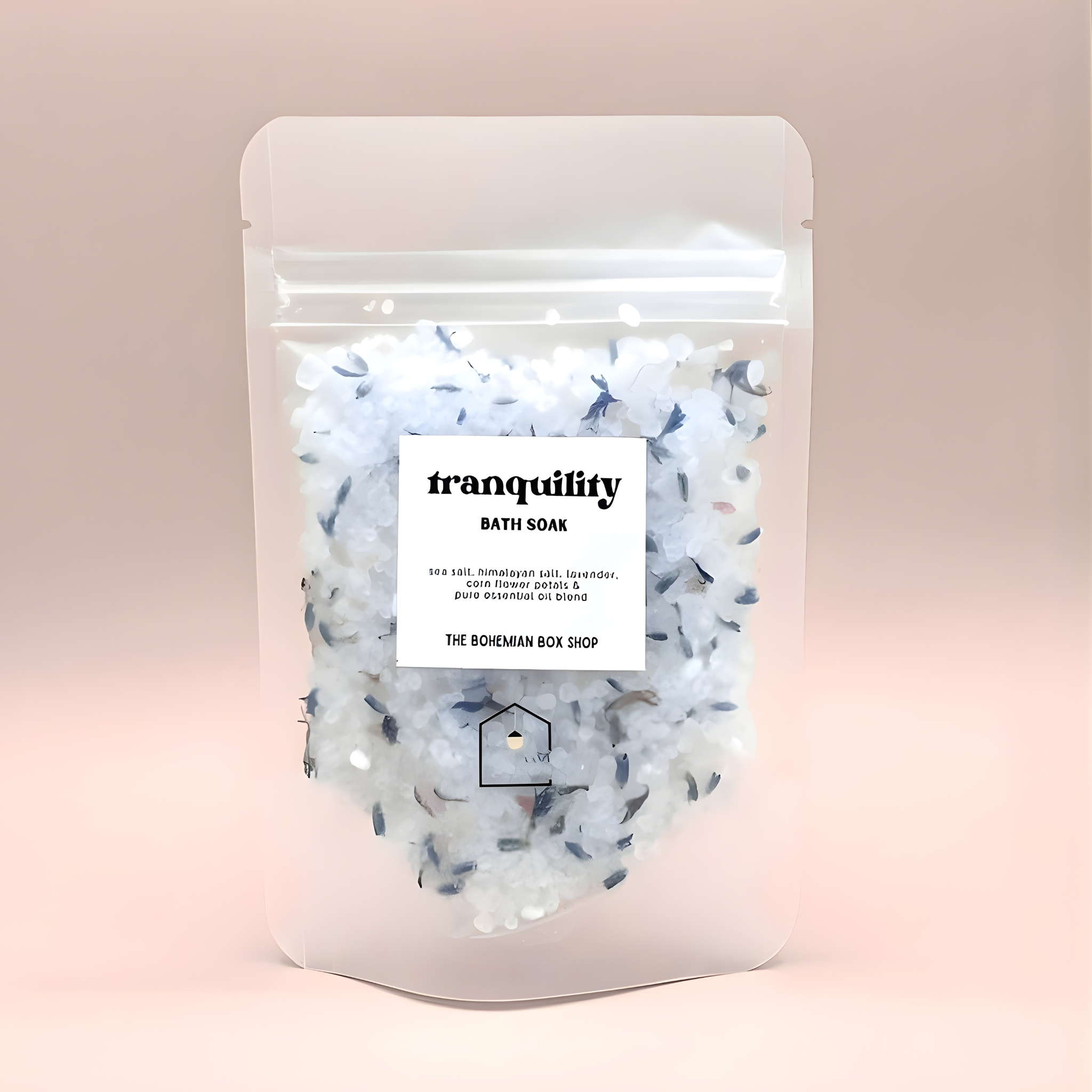 Bath soak package with 'tranquility' label on a pink background