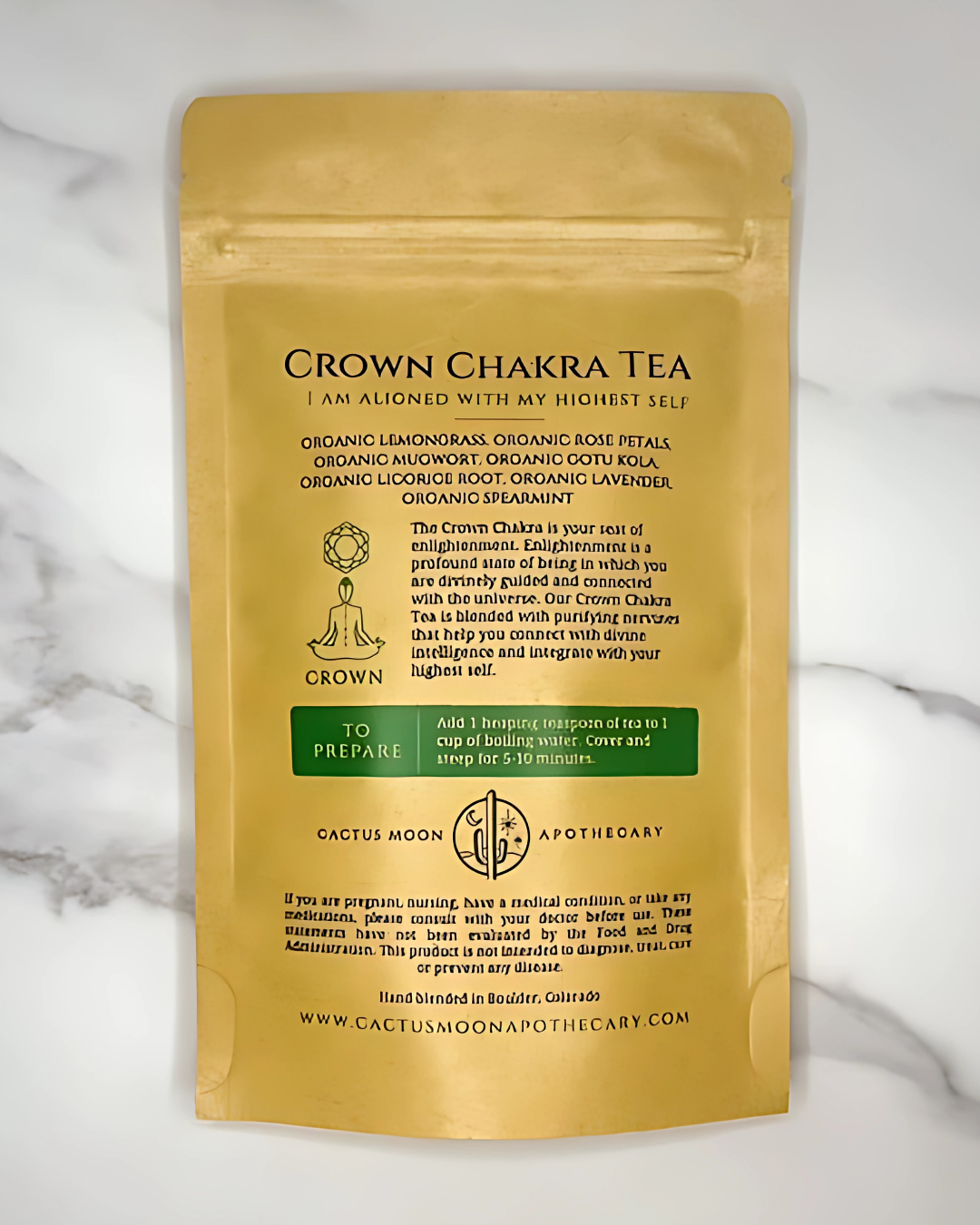 Gold packaging of Crown Chakra Tea with text on a white background