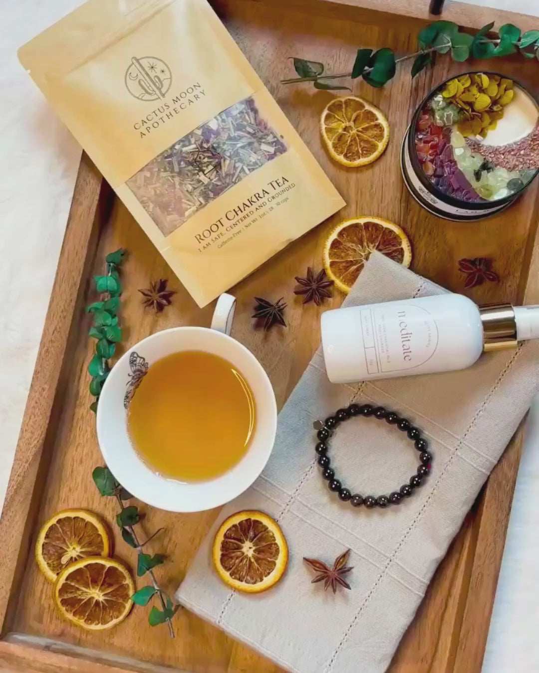 Tea root chakra i am me candle meditate aura spray garnet bracelet