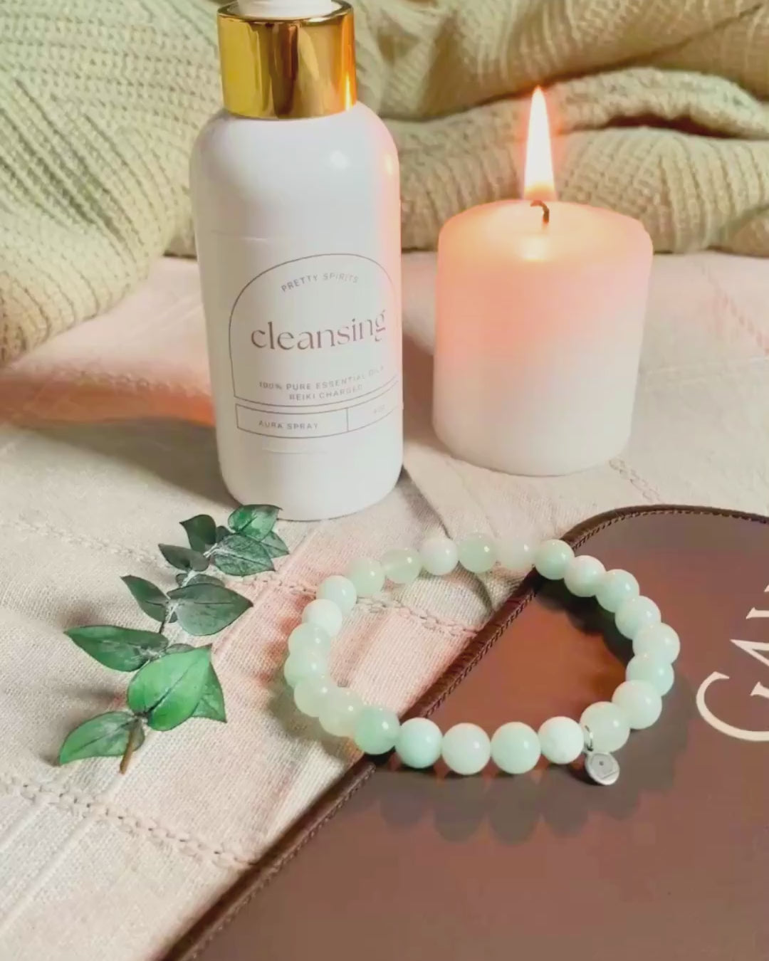 Cleansing spray, mint larimer intention bracelet on grounding mat